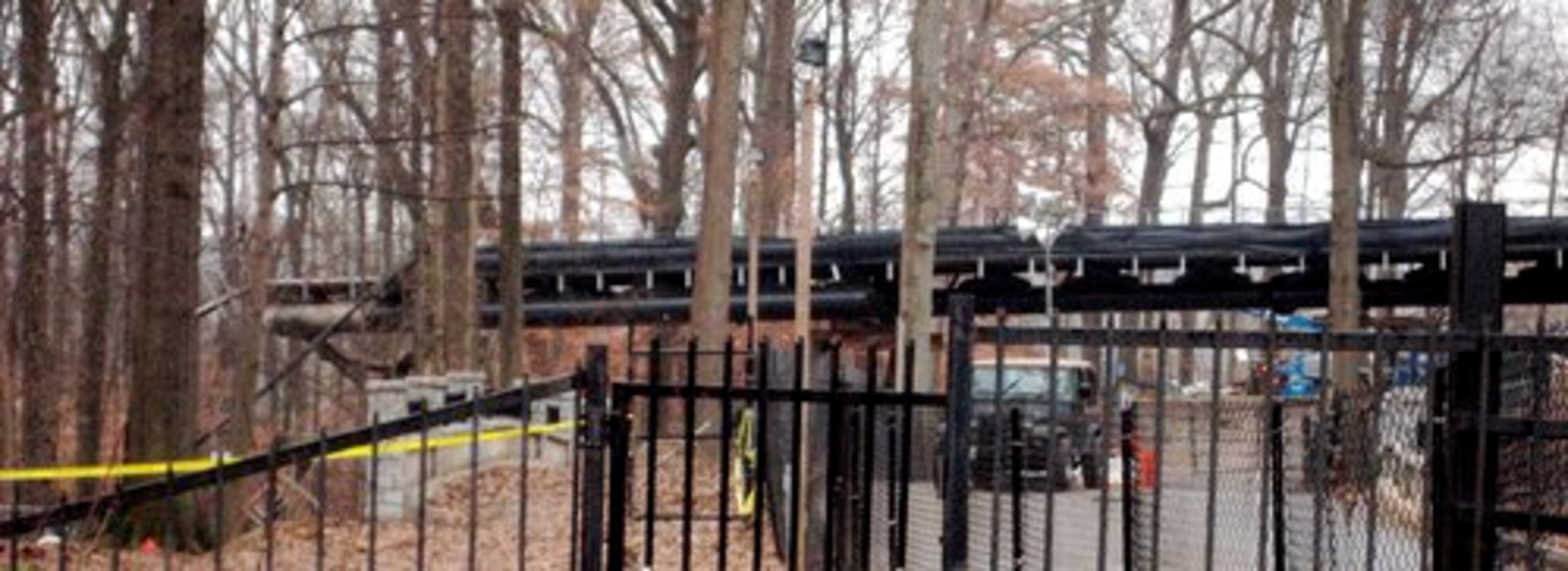 Collapsed pieces of a walkway still were visible from outside Piedmont Park.