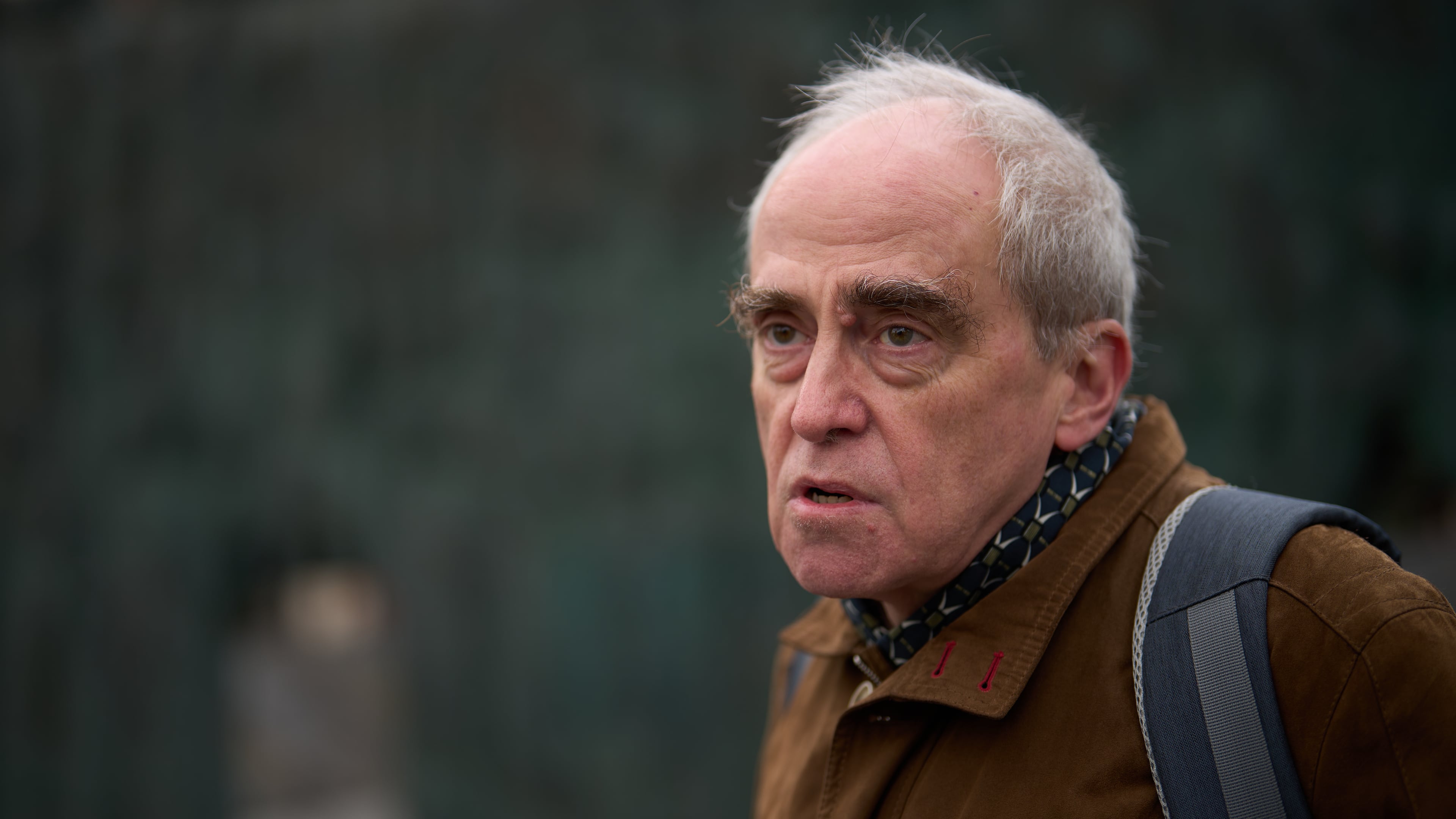 Jan Raczynski, chair of the International Memorial entity that was liquidated in Russia in 2021, speaks during his interview with the Associated Press in front of the Wall of Grief memorial to the victims of Soviet repressions in Moscow, Wednesday, April 8, 2026. (AP Photo/Alexander Zemlianichenko)