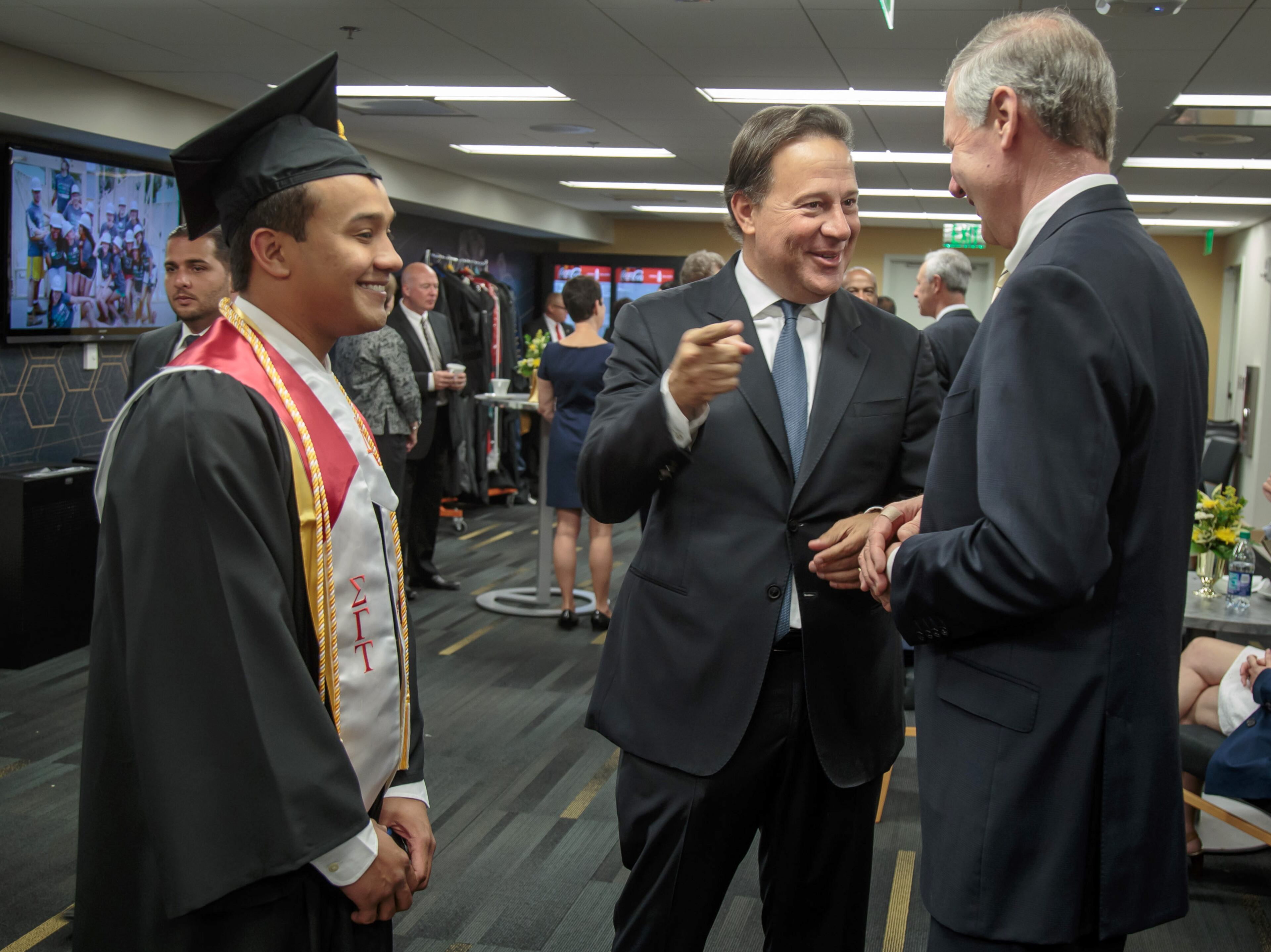 Commencement speaker, Panamanian president Juan Carlos Varela (C) talks with Georgia Institute of Technology president Dr. G. P. "Bud" Peterson (R) and graduating student Uliser Munez before the start of the morning graduation ceremonies at McCamish Pavilion Saturday, May 6, 2017. STEVE SCHAEFER / SPECIAL TO THE AJC