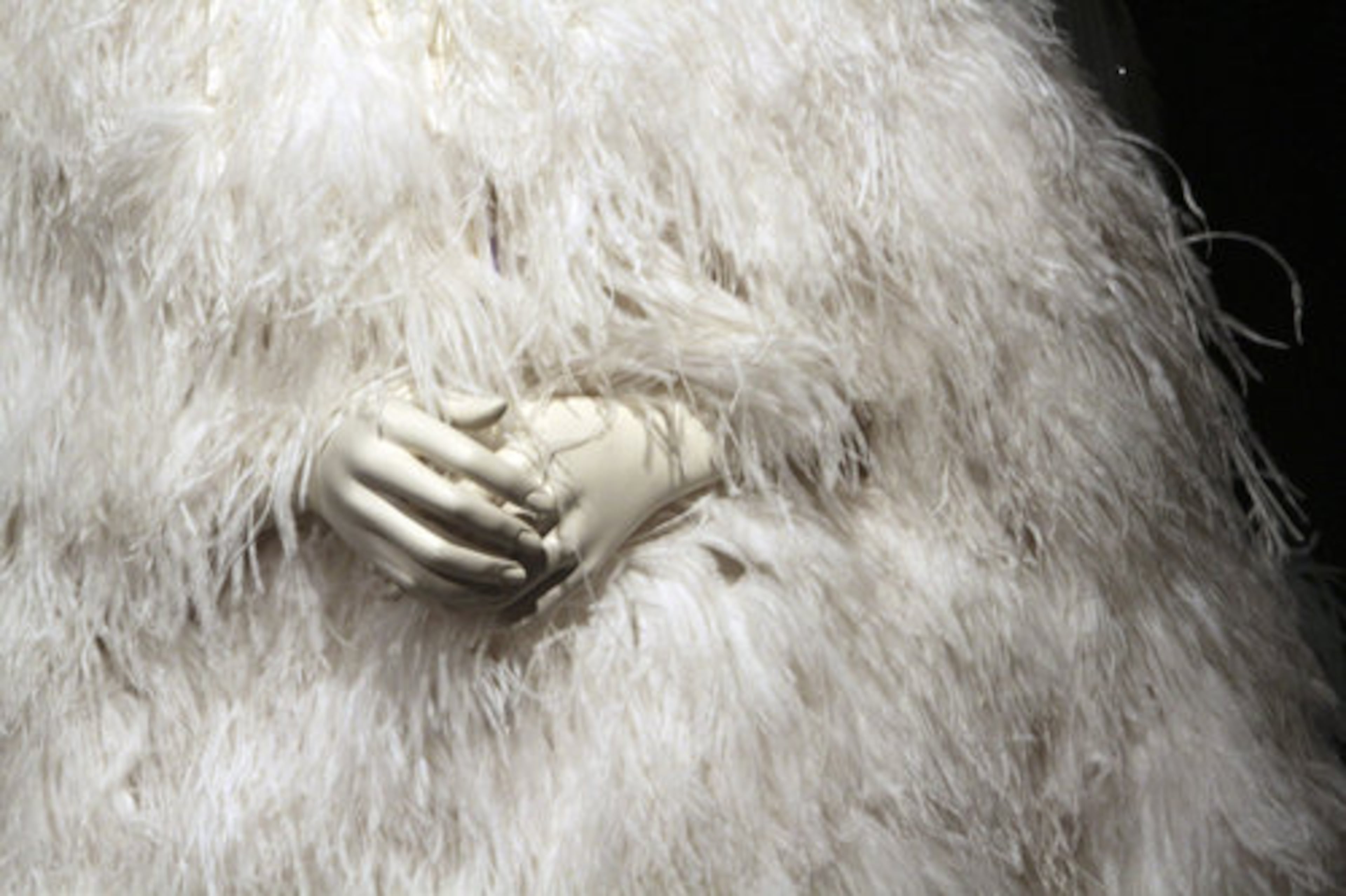 A white feather evening cape by Chris Levin is on display during a preview of the full Collection of Elizabeth Taylor at Christie's, Thursday, Dec. 1, 2011 in New York. The collection will be up for auction in person and online, a first for Christie's, from Dec. 13-17.