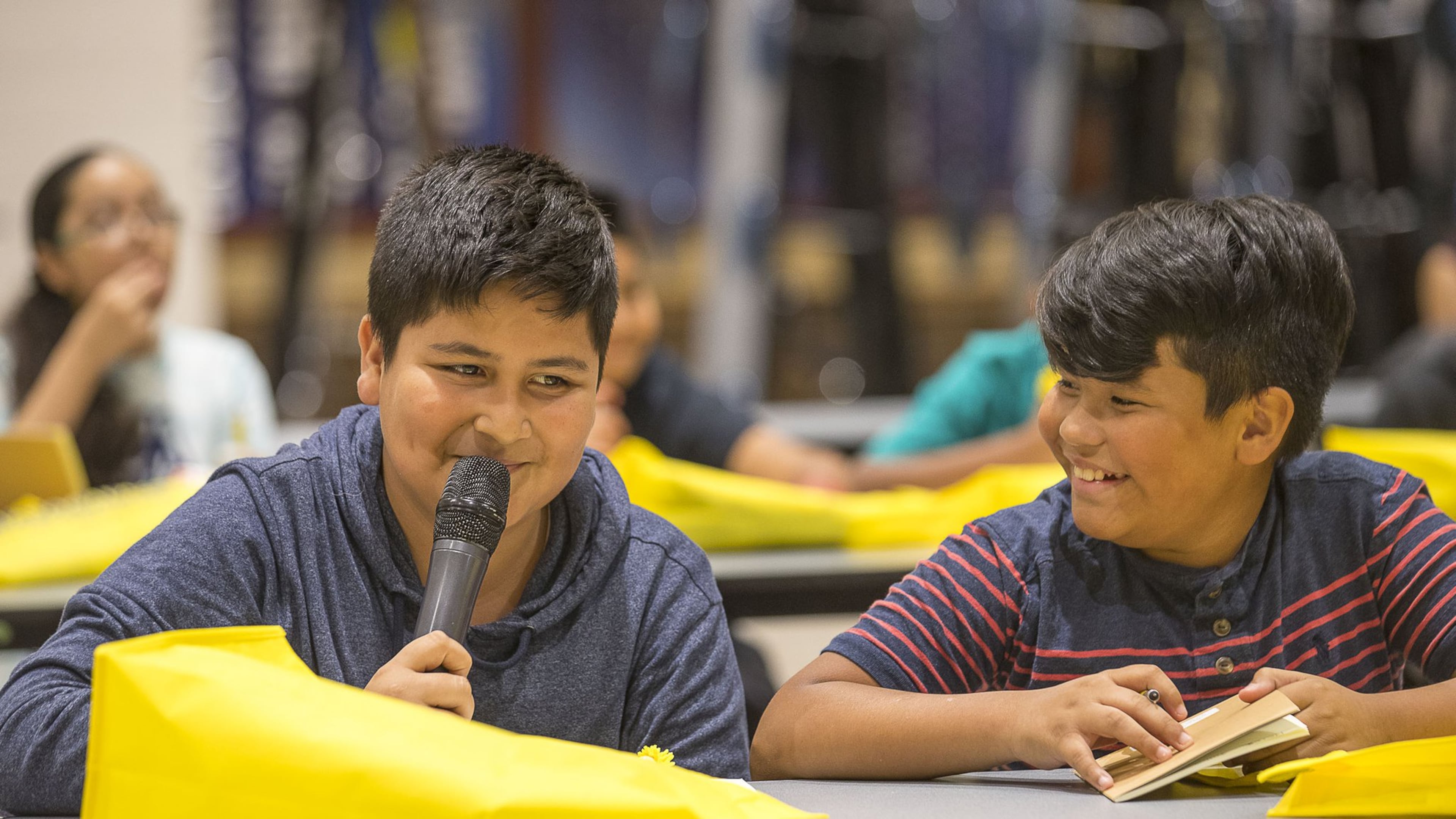 Lilburn Middle School student Andres Rodriguez (left) talks with to his peers about what he has learned from Georgia State Rep. Brenda Lopez Romero during the Hispanic Mentoring Priority Summer Program for the Gwinnett County Public Schools at Meadowcreek High School in Norcross, on Monday, July 15, 2019. Rep. Brenda Lopez Romero talked with students about her career pathway and encouraged them to never give up. ALYSSA POINTER/ALYSSA.POINTER@AJC.COM