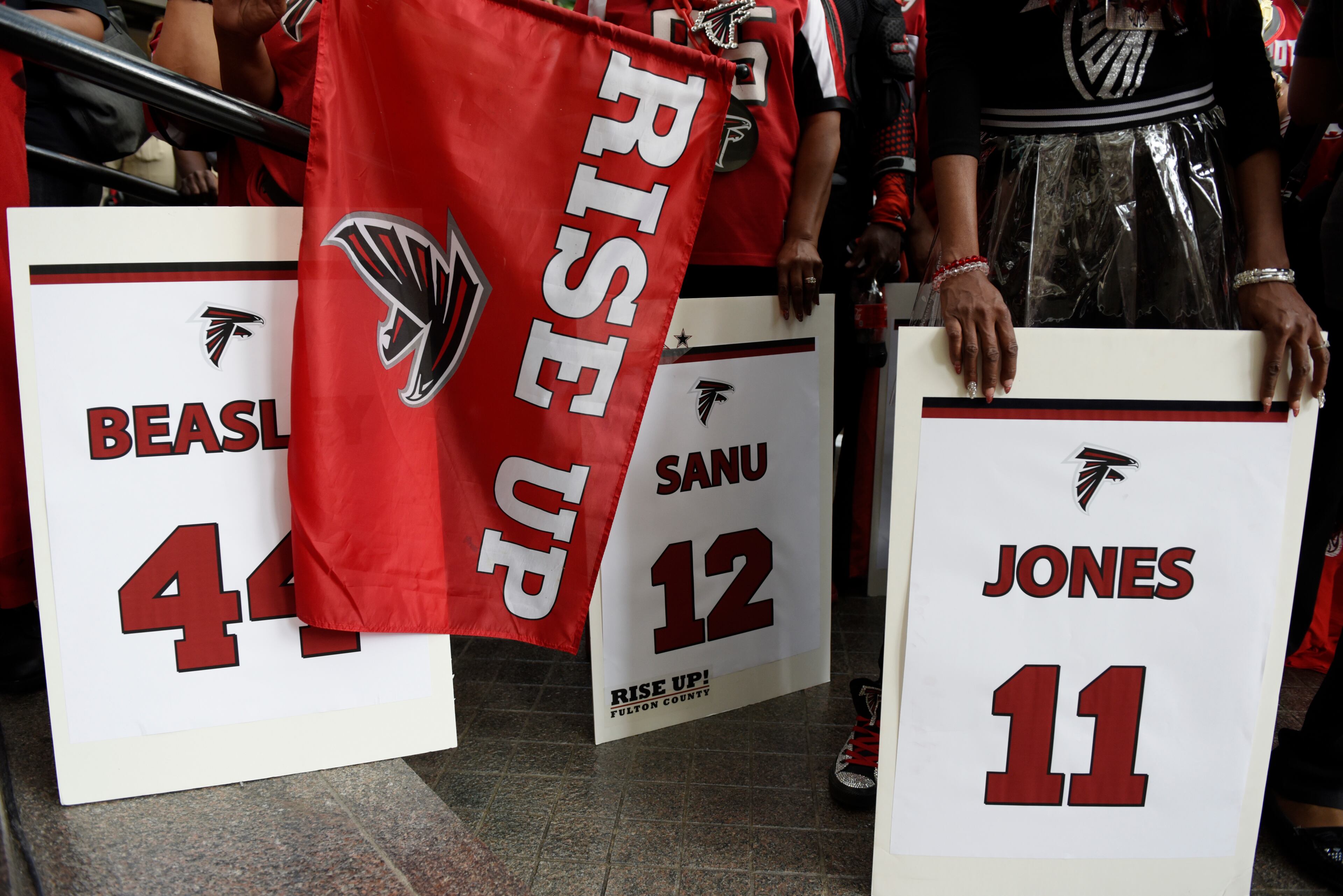 January 20, 2017, Atlanta - Fans hold signs and flags during a pep rally for the upcoming NFC Championship game against the Packers in Atlanta, Georgia, on Friday, January 20, 2017. (DAVID BARNES / DAVID.BARNES@AJC.COM)
