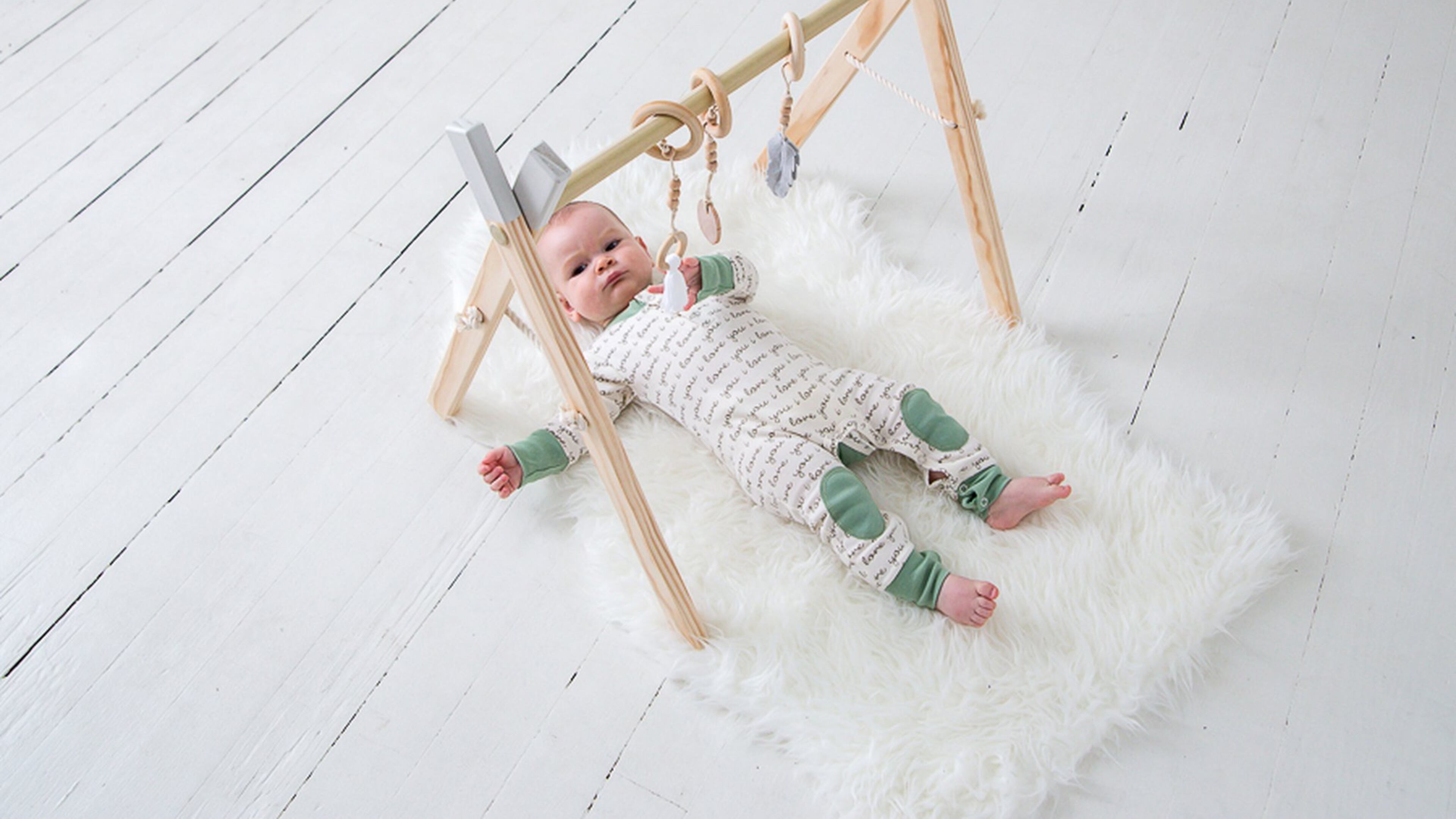 Marietta-based Clover and Birch creates modern wooden toys, including its best-selling activity gym for babies.
