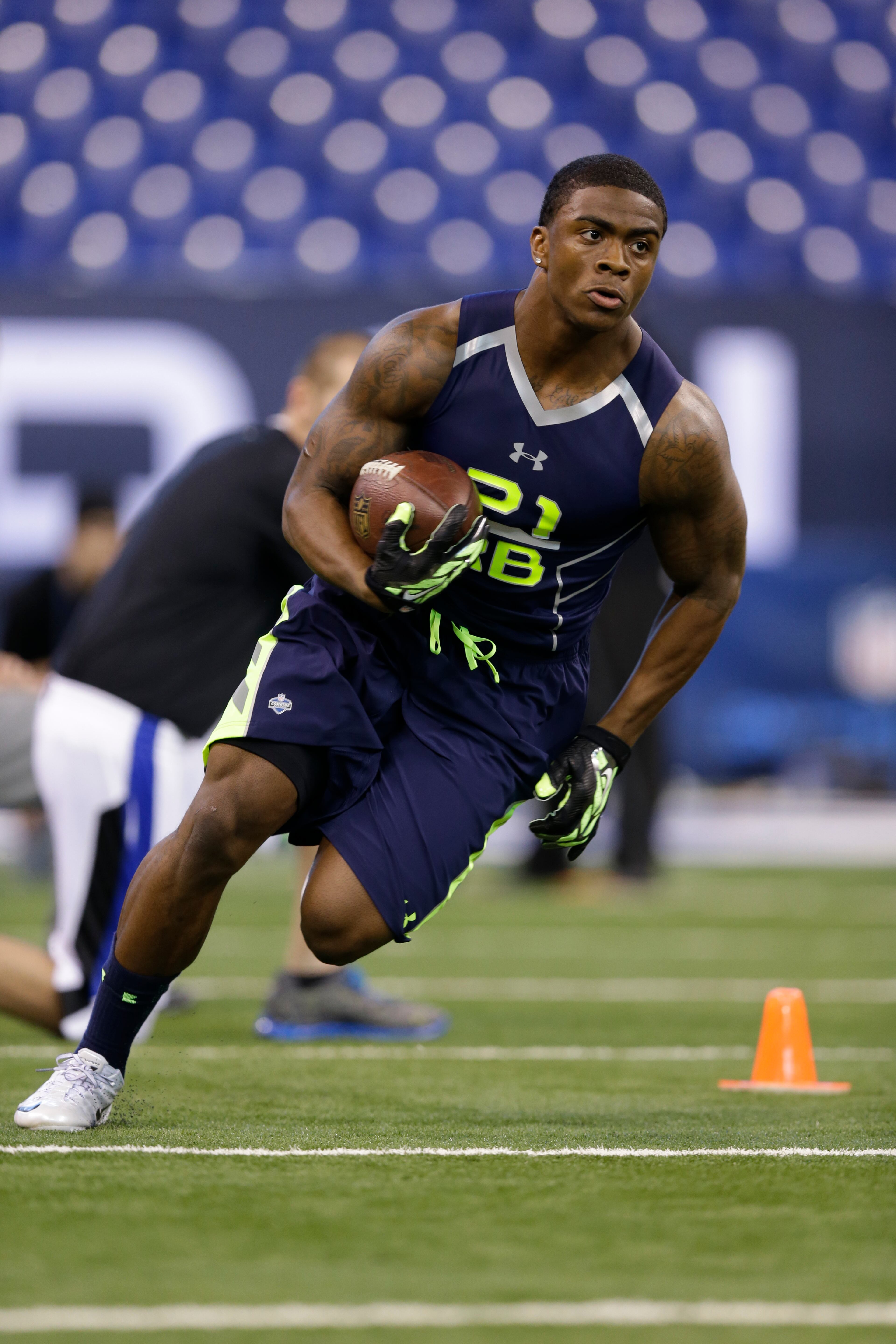 Georgia Southern running back Jerick Mckinnon runs a drill at the NFL football scouting combine in Indianapolis, Sunday, Feb. 23, 2014. (AP Photo/Michael Conroy)