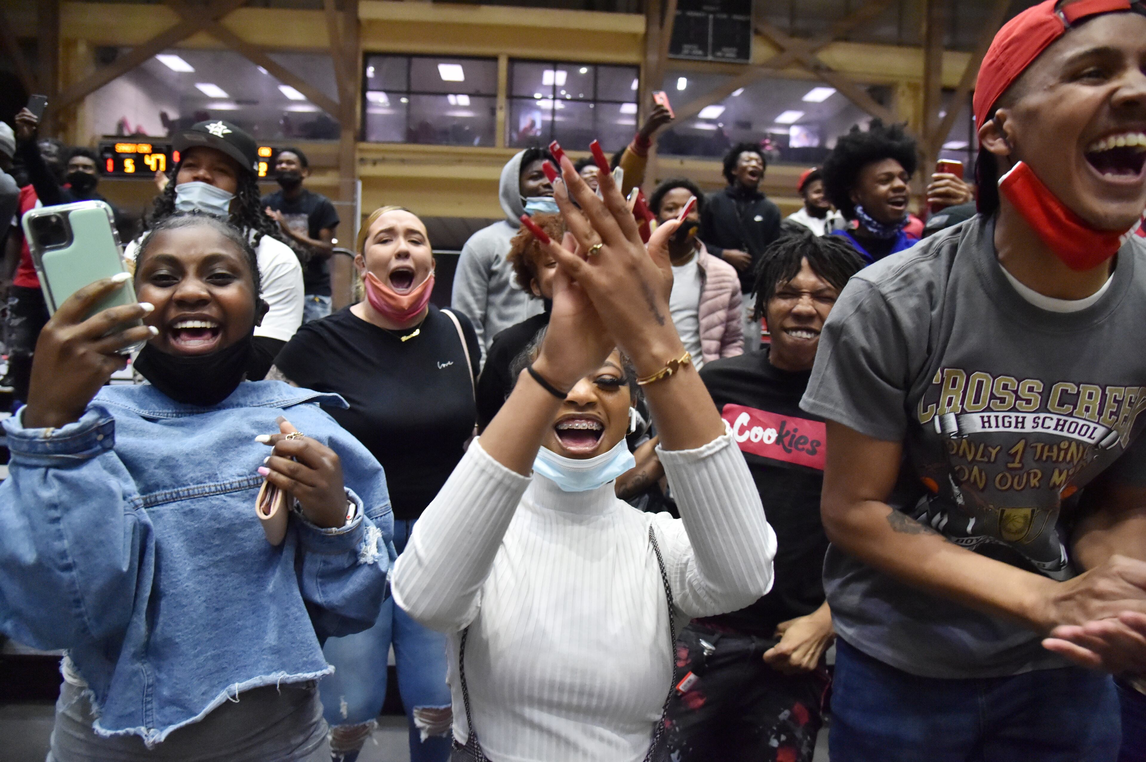 Cross Creek fans cheer for their team during the 2021 GHSA State Basketball Class AAA Boys Championship game at the Macon Centreplex in Macon on Friday, March 12, 2021 Cross Creek won 57-49 over Sandy Creek. (Hyosub Shin / Hyosub.Shin@ajc.com)