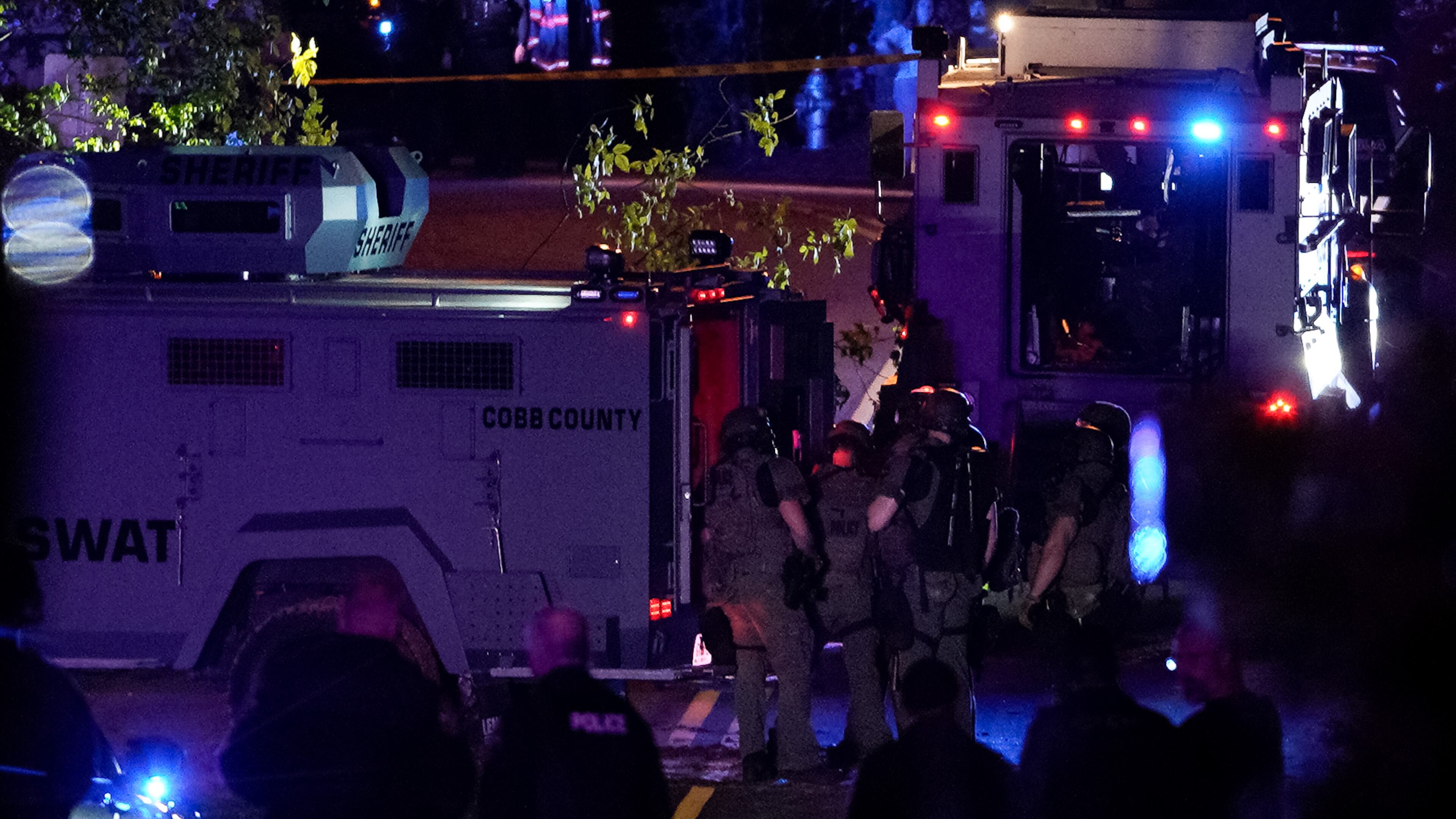 A man and a woman were found dead inside a Marietta home after a SWAT standoff ended Saturday night.