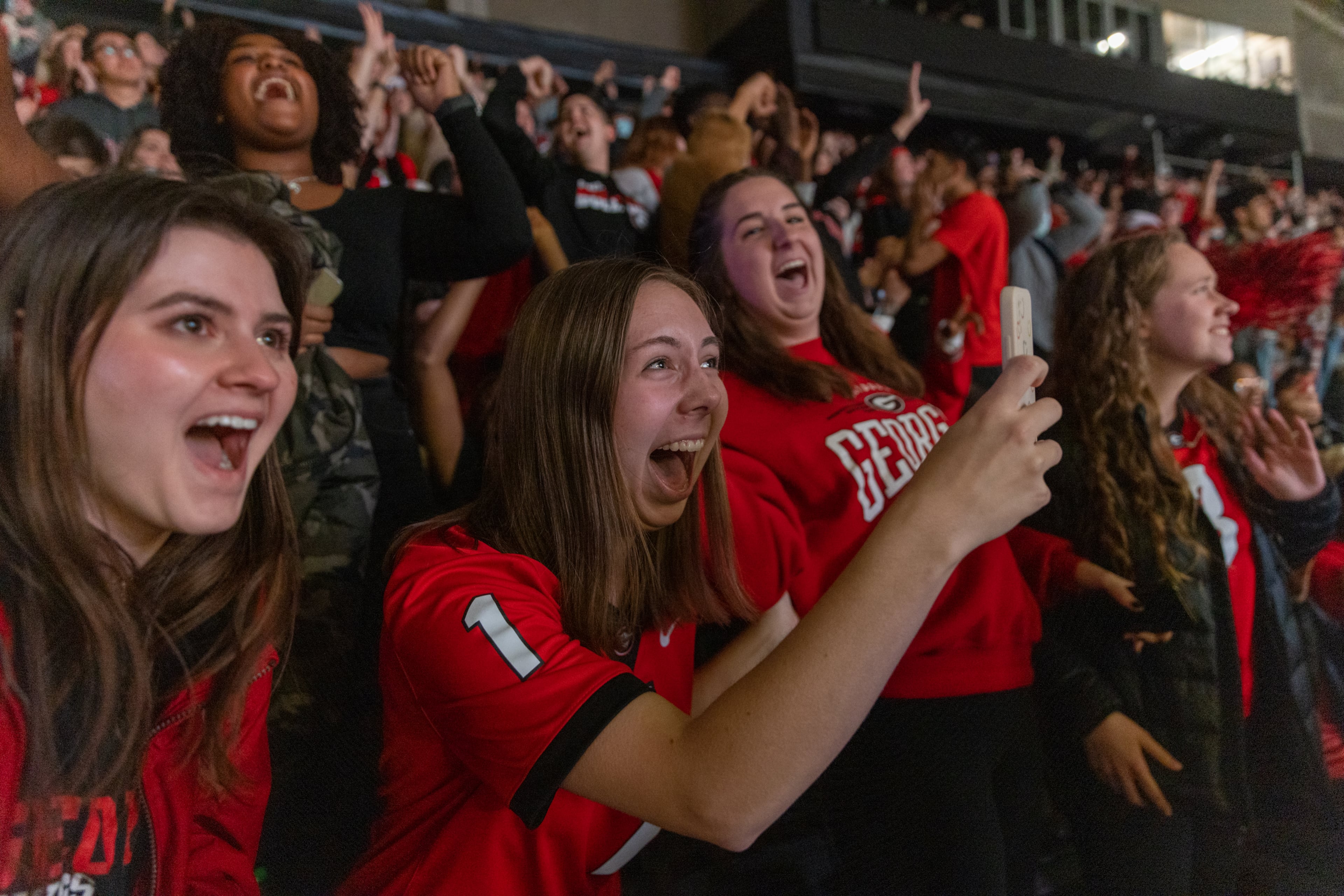 Georgia Bulldogs fans react to a touchdown, that was then overturned, during the College Football Playoff national championship game at a watch party at Stegeman Coliseum on the University of Georgia campus on Monday, January 10, 2022. (Photo: Nathan Posner for The Atlanta Journal-Constitution)
