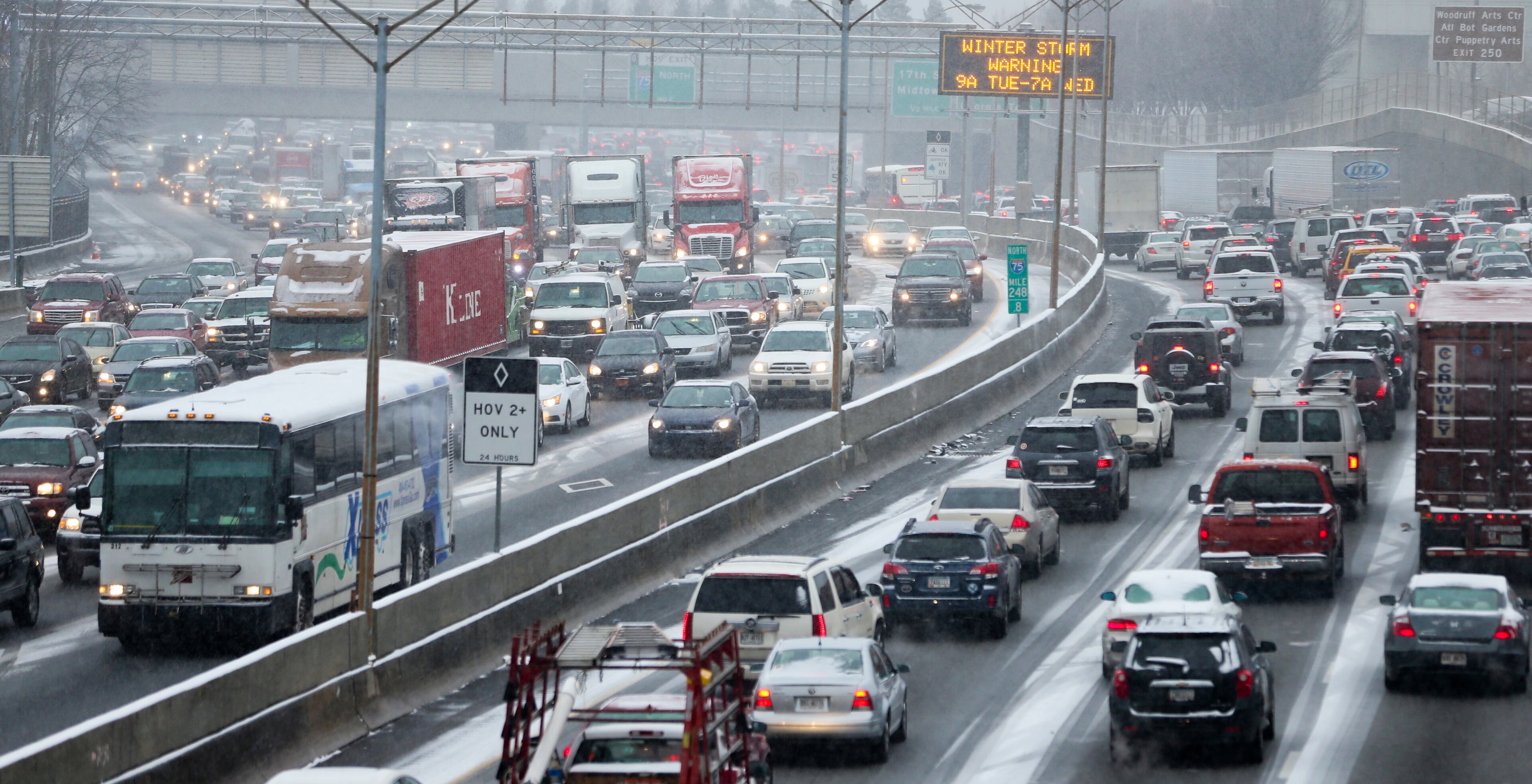 Jan. 24, 2014 Atlanta: Traffic was grid locked on the connector Tuesday afternoon, Jan. 28, 2014 as many employers let their employees off all at the same time. The winter storm that paralyzed metro Atlanta and other parts of Georgia prompted Gov. Nathan Deal to declare a state of emergency Tuesday afternoon, Jan.28, 2014 for all 159 counties. In a matter of hours, snow blanketed the area. But any hopes of a winter wonderland were dashed by a more miserable reality. Take rush-hour traffic in Atlanta, add inches of slushy, slick mess and the result is gridlock on interstates in all directions. For hours, roads and interstates have remained jammed stranding some drivers, and there were too many wrecks to count Tuesday afternoon as a winter storm continued to dump snow across metro Atlanta. Many school systems dismissed early, sending some parents scrambling home. Others seemed to hit the roads, too. But it was anything but a typical commute, even by Atlanta standards. Drivers reported commutes of more than three hours. Some school buses couldnt run routes and were forced to return to schools. And teachers and students were faced Tuesday afternoon with the real possibility of spending the night in the classroom. JOHN SPINK/JSPINK@AJC.COM Last year's snow storm not only snarled traffic, it also held down spending by lobbyists on state lawmakers. JOHN SPINK/JSPINK@AJC.COM