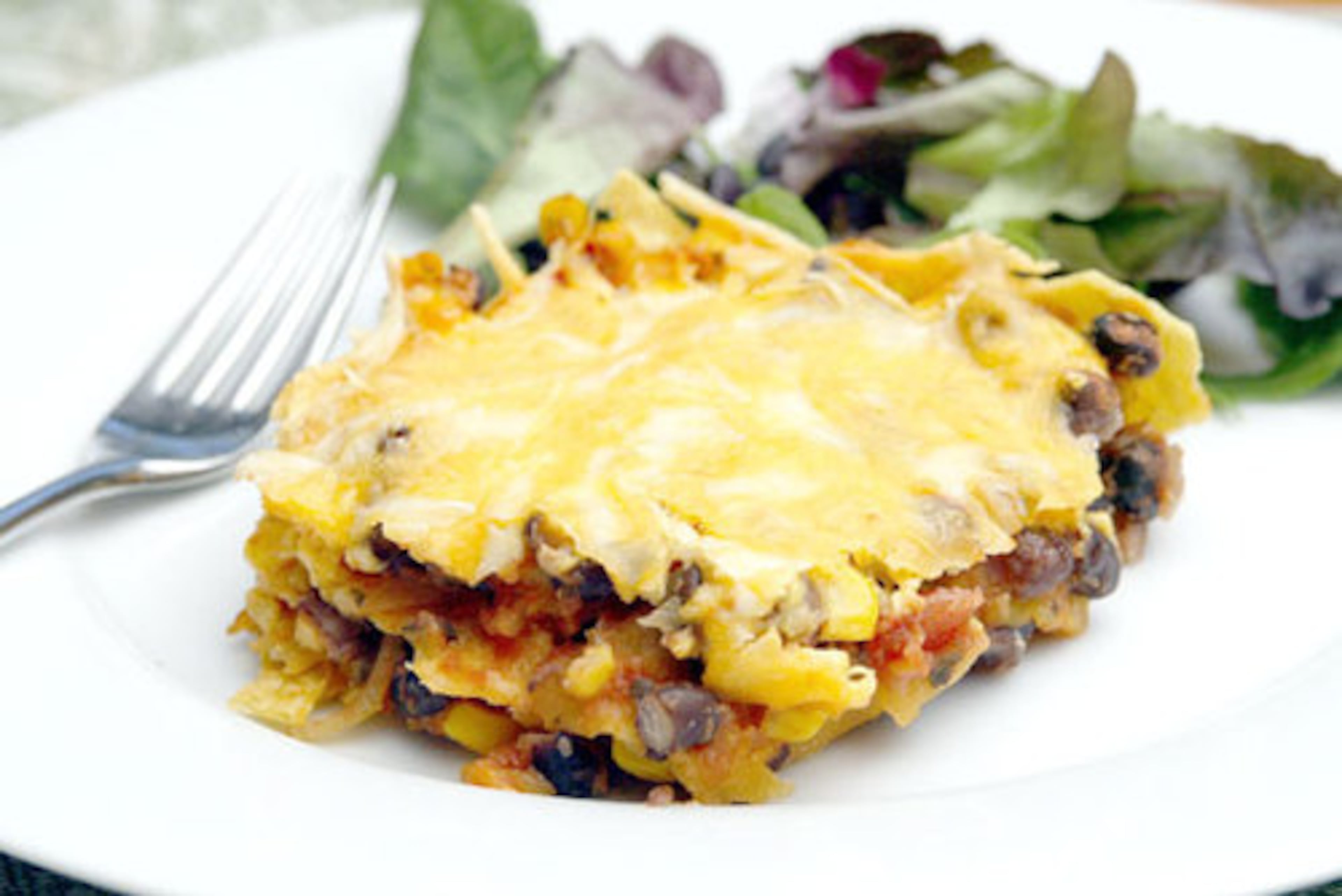 Black Bean Chilaquiles: Enjoy this dish of glorified nachos with a garnish of fresh cilantro and a squeeze of lime. For a non-vegetarian entree, add cooked, shredded chicken.