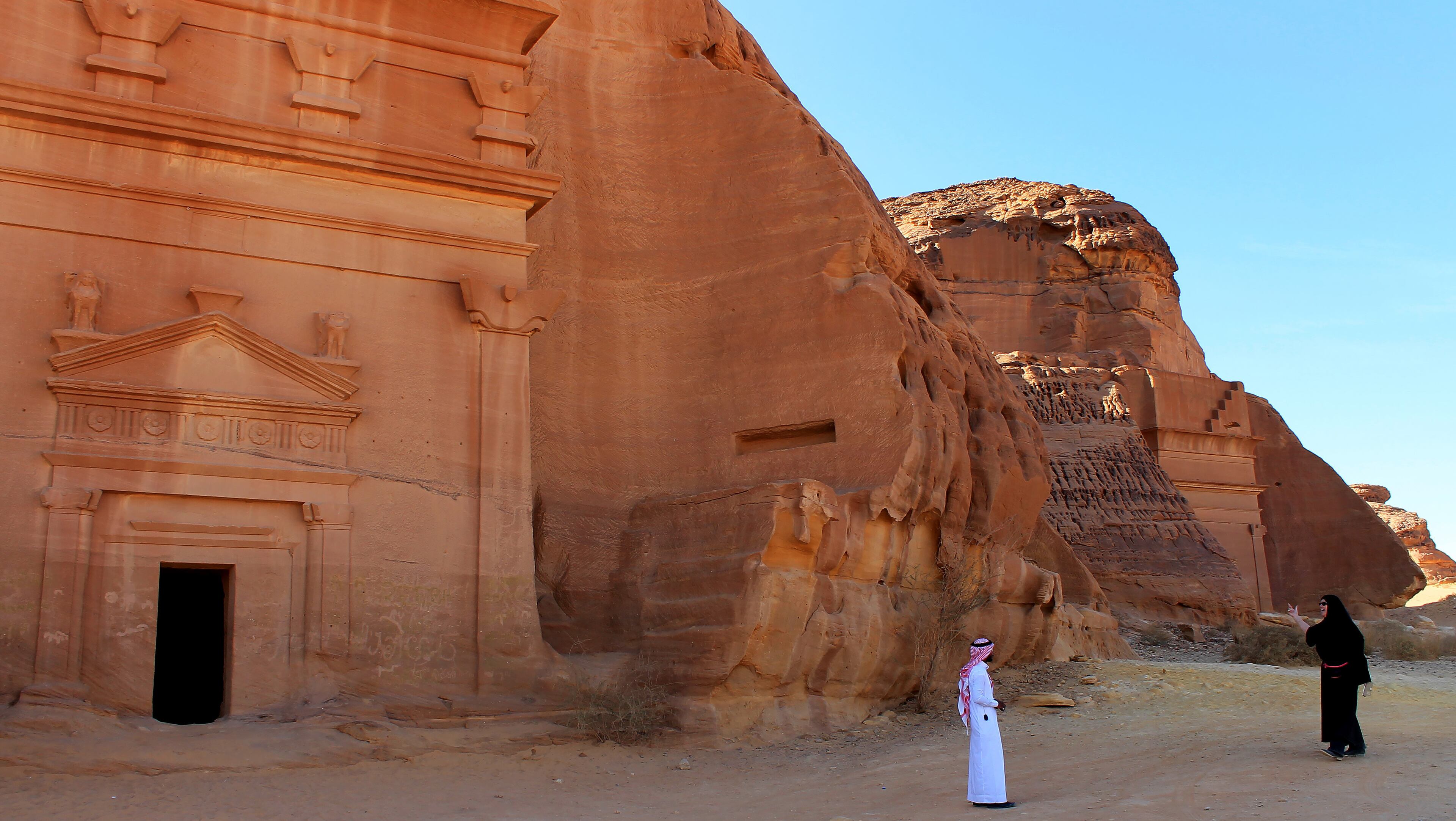 Birgit Mitchell, an American tourist (right) visits Mada'in Saleh, a UNESCO World Heritage Site, with her guide in Mada'in Saleh, Saudi Arabia, on Jan. 31, 2017. Bloomberg photo bgy Vivian Nereim.
