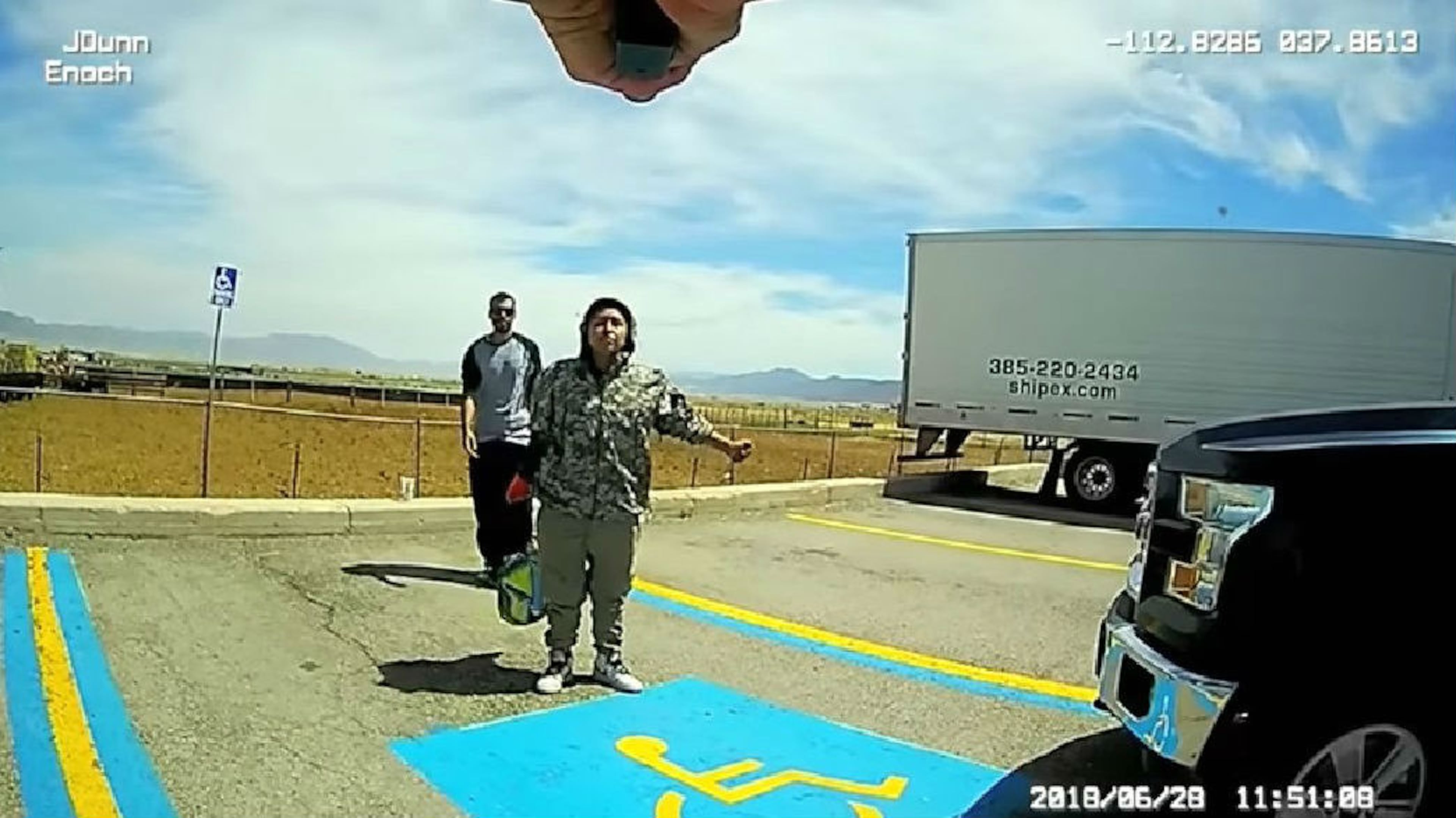 Ivonne Casimiro, 29, of Las Vegas, is seen, screwdriver in hand, during a confrontation with Enoch, Utah, police Cpl. Jeremy Dunn June 28, 2018, at a truck stop in Parowan, Utah. Dunn moments later shot Casimiro, who refused to drop the screwdriver, in the knee. Casimiro was one of three people suspected of burglarizing vehicles in the business's parking lot.