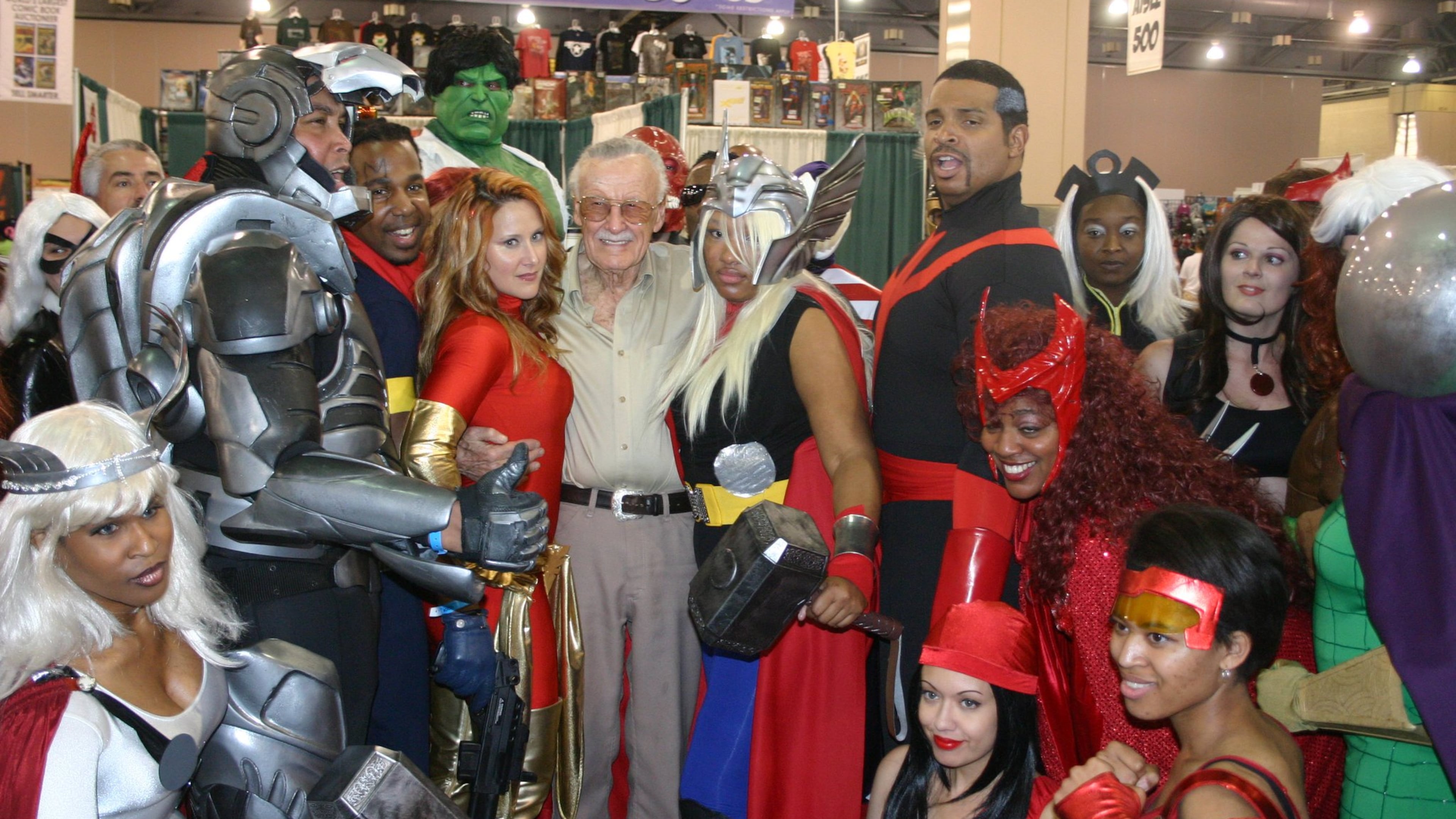 Stan Lee, co-creator of the Fantastic Four, Spider-Man, the Hulk and other superheroes of the Marvel Comics universe, hangs out with cosplay fans at a recent comics convention. CONTRIBUTED BY JASON ROCCO