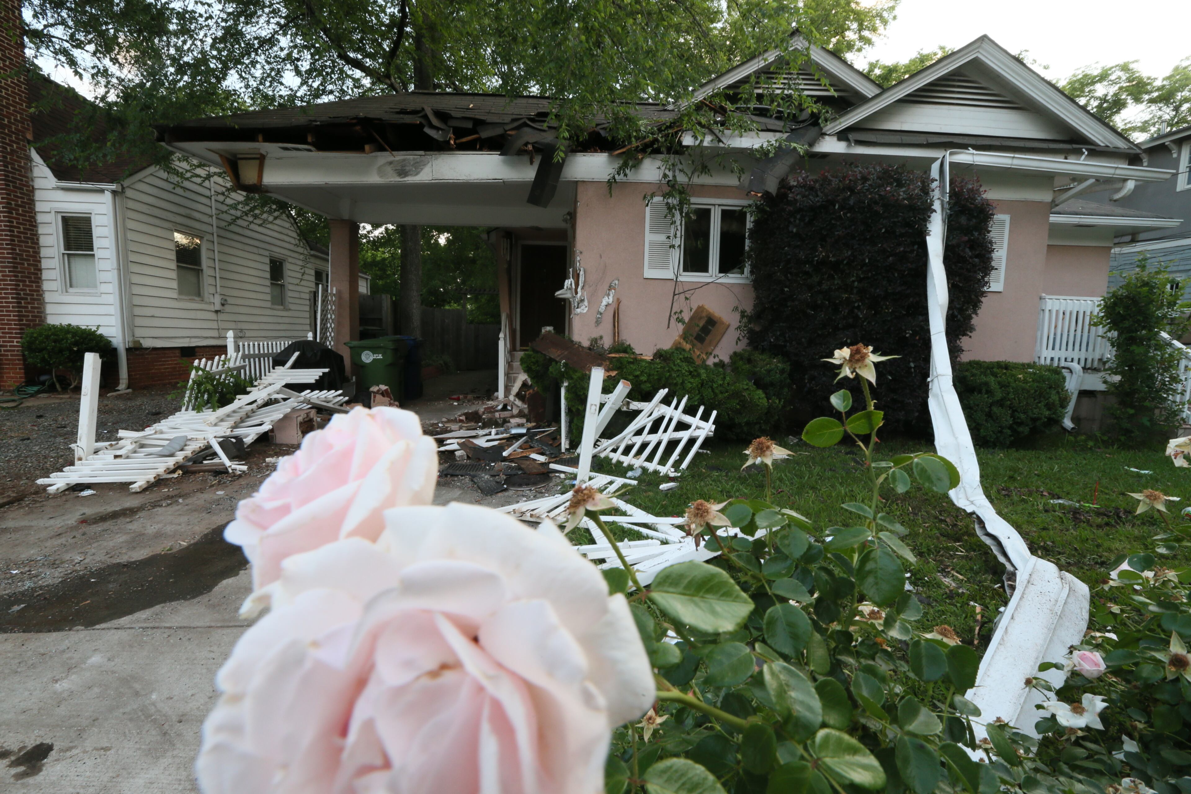 A car theft suspect fleeing police became a one-man wrecking crew early Tuesday, hitting a house as well as several cars parked along a northwest Atlanta street. JOHN SPINK/JSPINK@AJC.COM