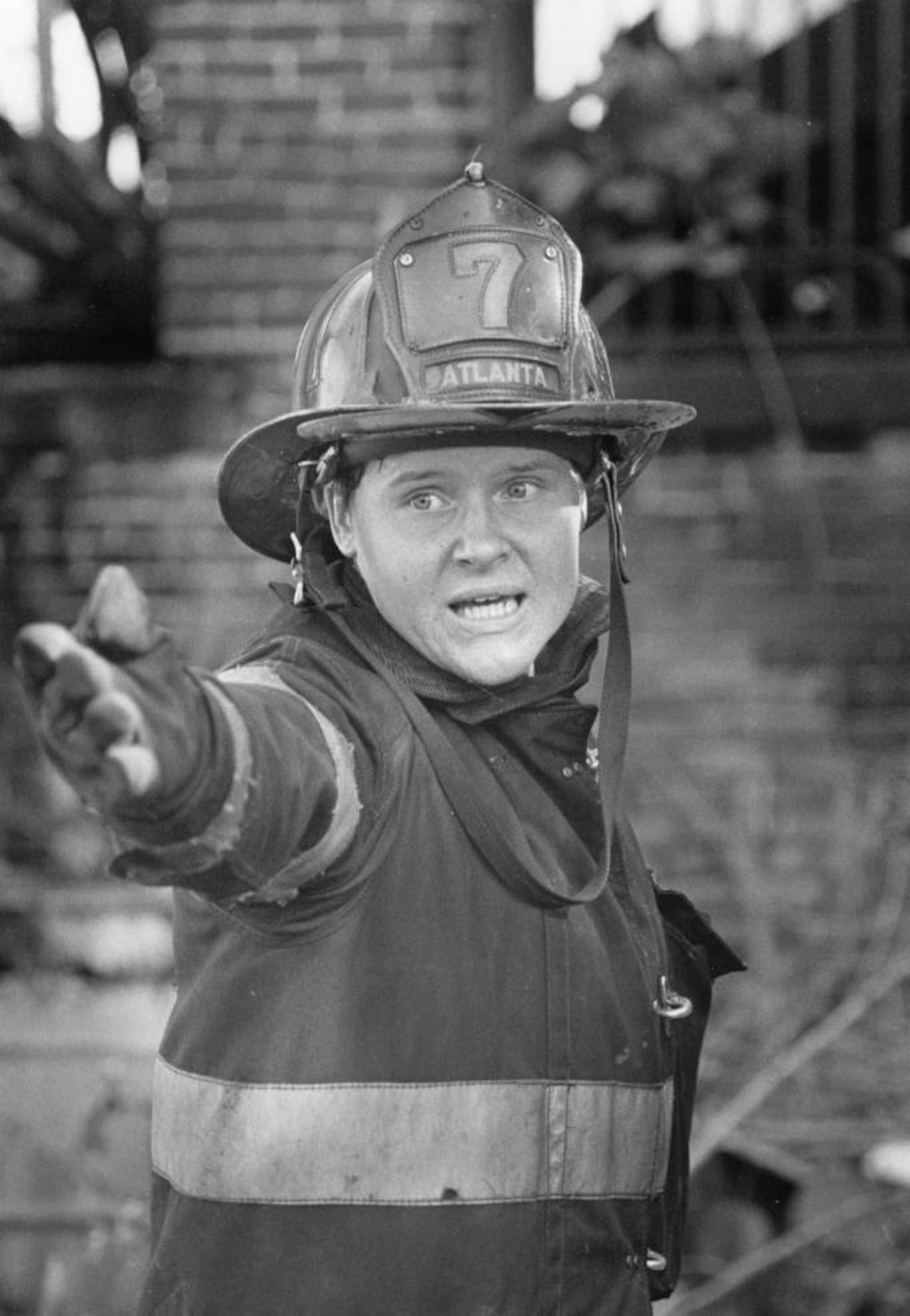 Fire Station No. 7 firefighter Debbie Creech on the scene of a fire in Atlanta, October 17, 1986. Billy Down/AJC