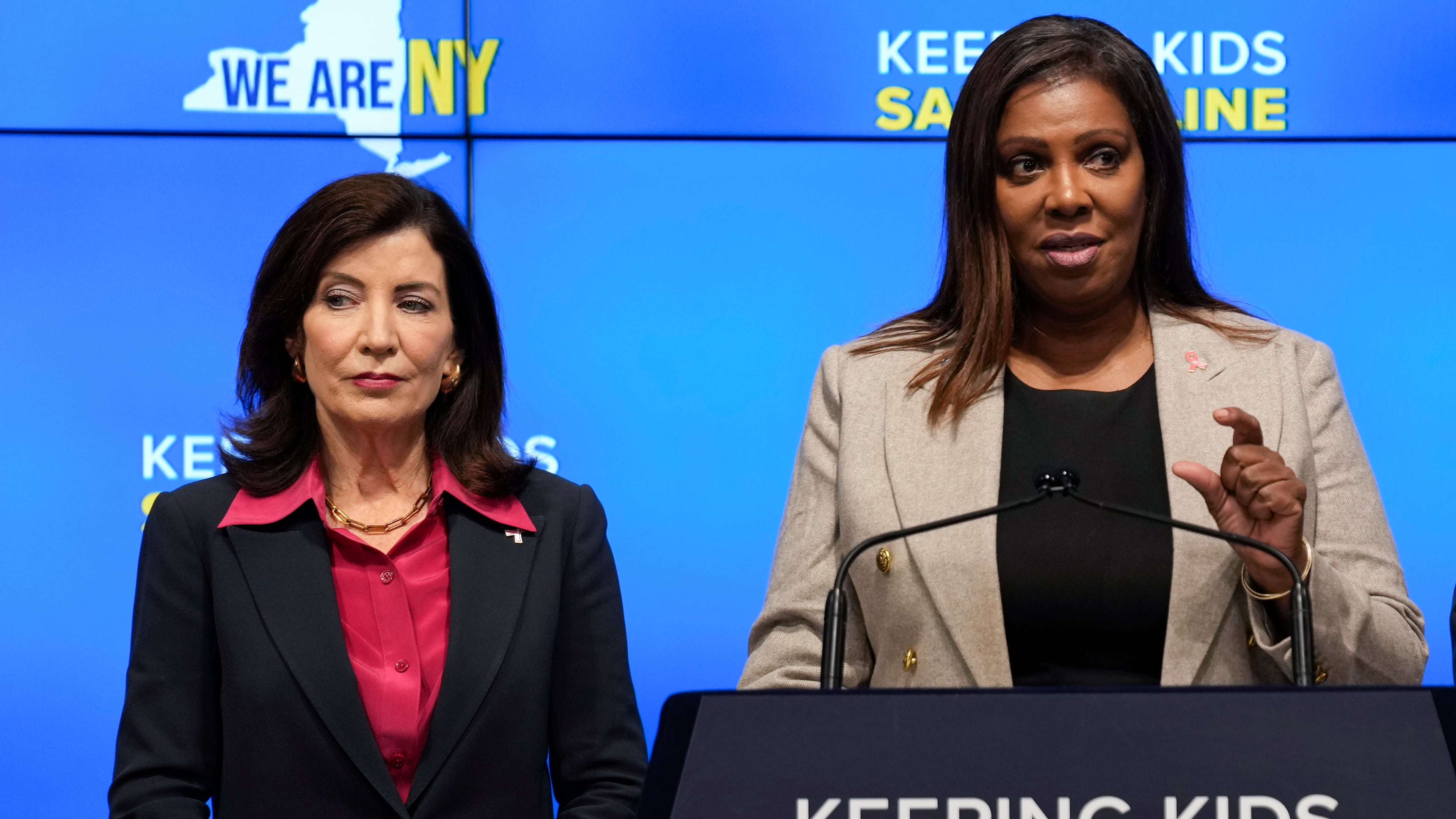 FILE - New York Gov. Kathy Hochul, left, listens as Attorney General Letitia James speaks during a news conference in New York, Oct. 11, 2023. (AP Photo/Seth Wenig, File)