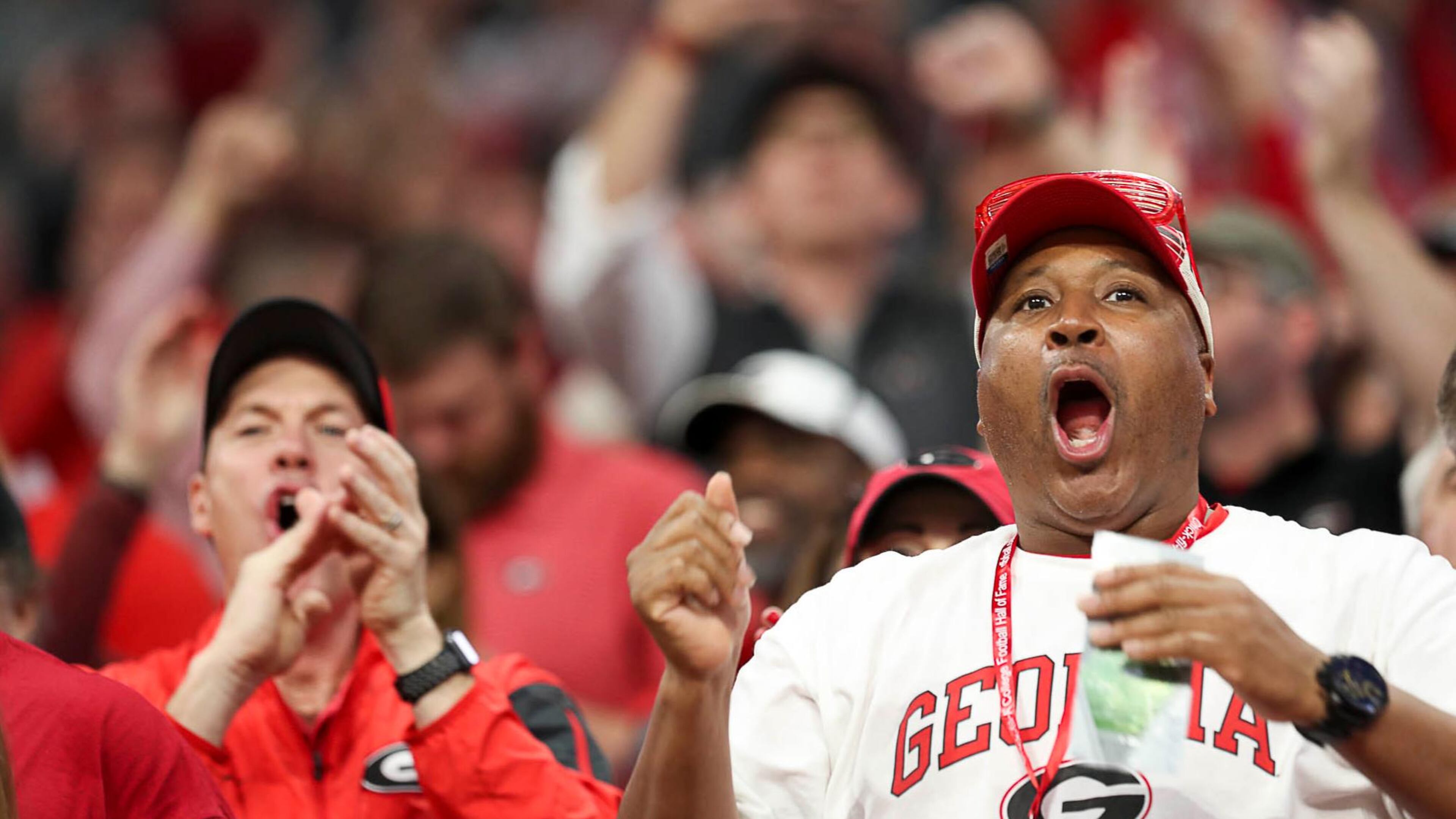 Georgia Bulldogs fans watch at Mercedes-Benz Stadium in Atlanta, Saturday, December 1, 2018. (ALYSSA POINTER/ALYSSA.POINTER@AJC.COM)