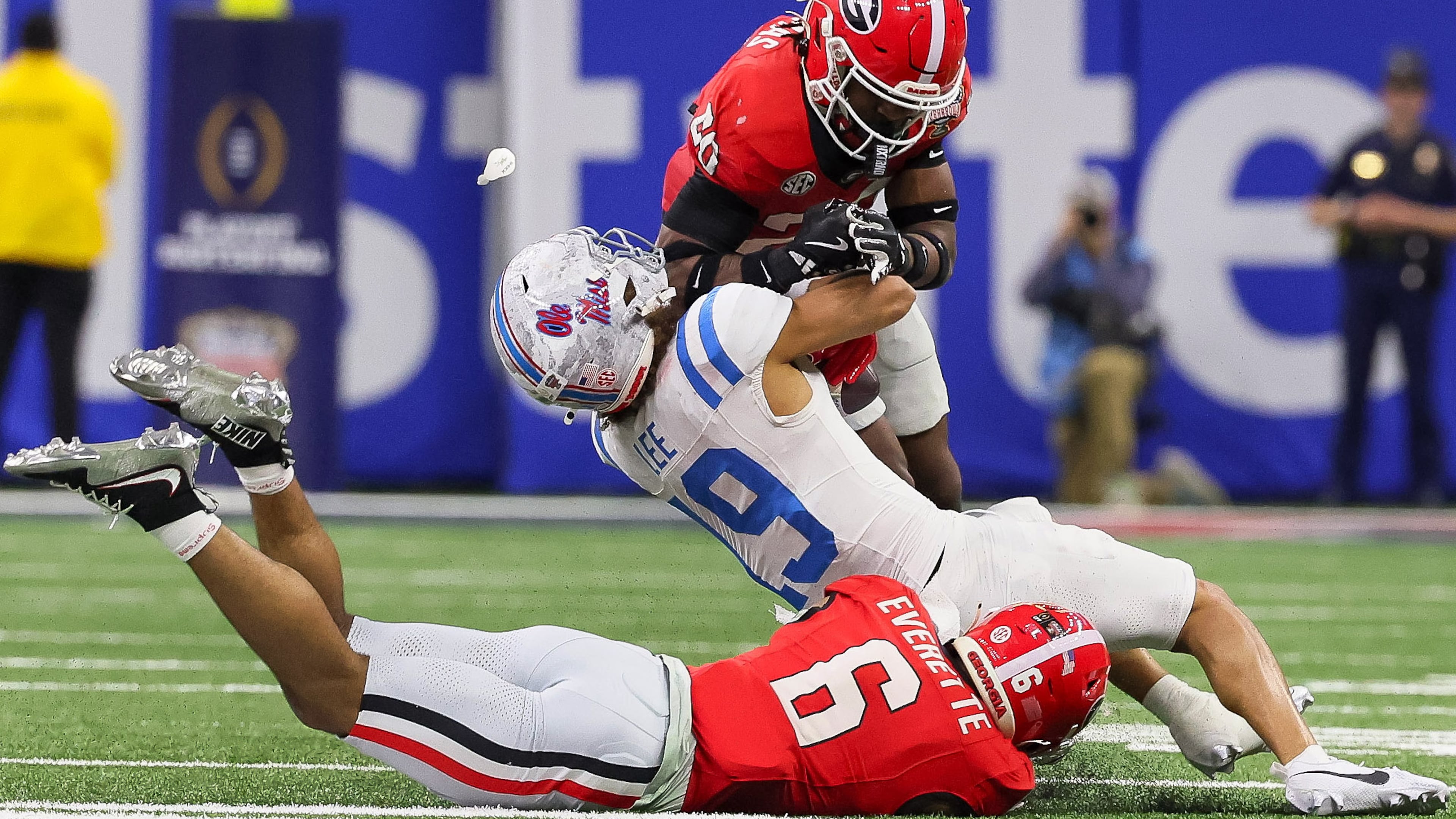 Ole Miss earned the SEC $14 million for its College Football Playoff appearances, and Georgia raked in $8 million for the conference. (Jason Getz/AJC)