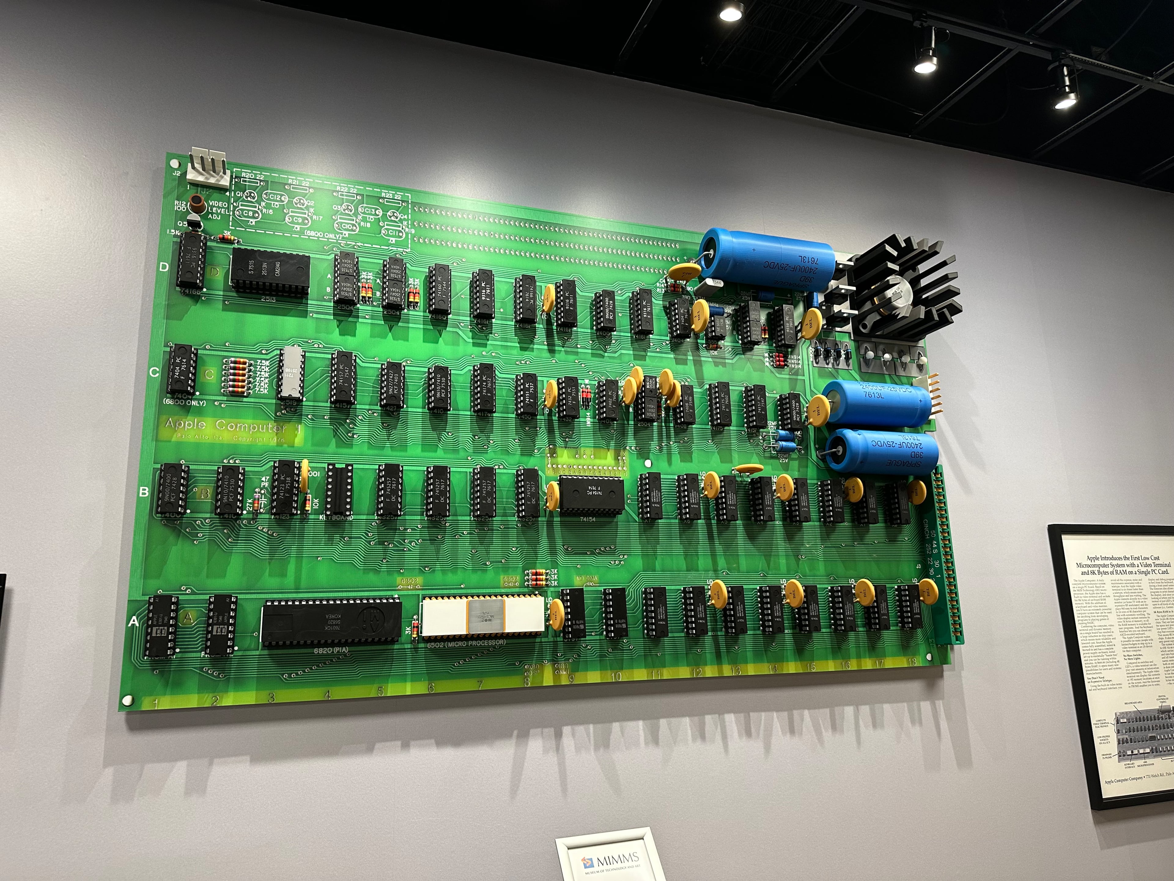 Lonnie Mimms' daughter Caroline Gryder used 3D printers to create an oversized replica of the original Apple I motherboard that Steve Wozniak made in 1976. It's at the Mimms Museum of Technology and Art. (Rodney Ho/AJC)