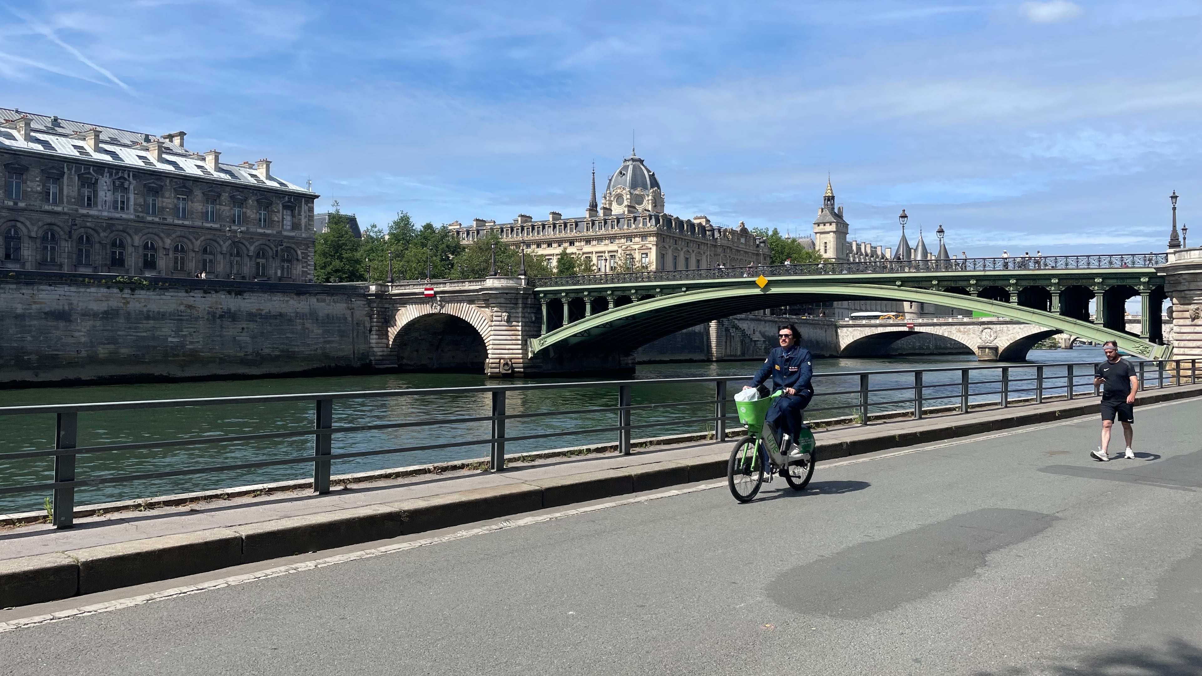 A man rides an e-bicycle in Paris. (Courtesy Dave Edwards)