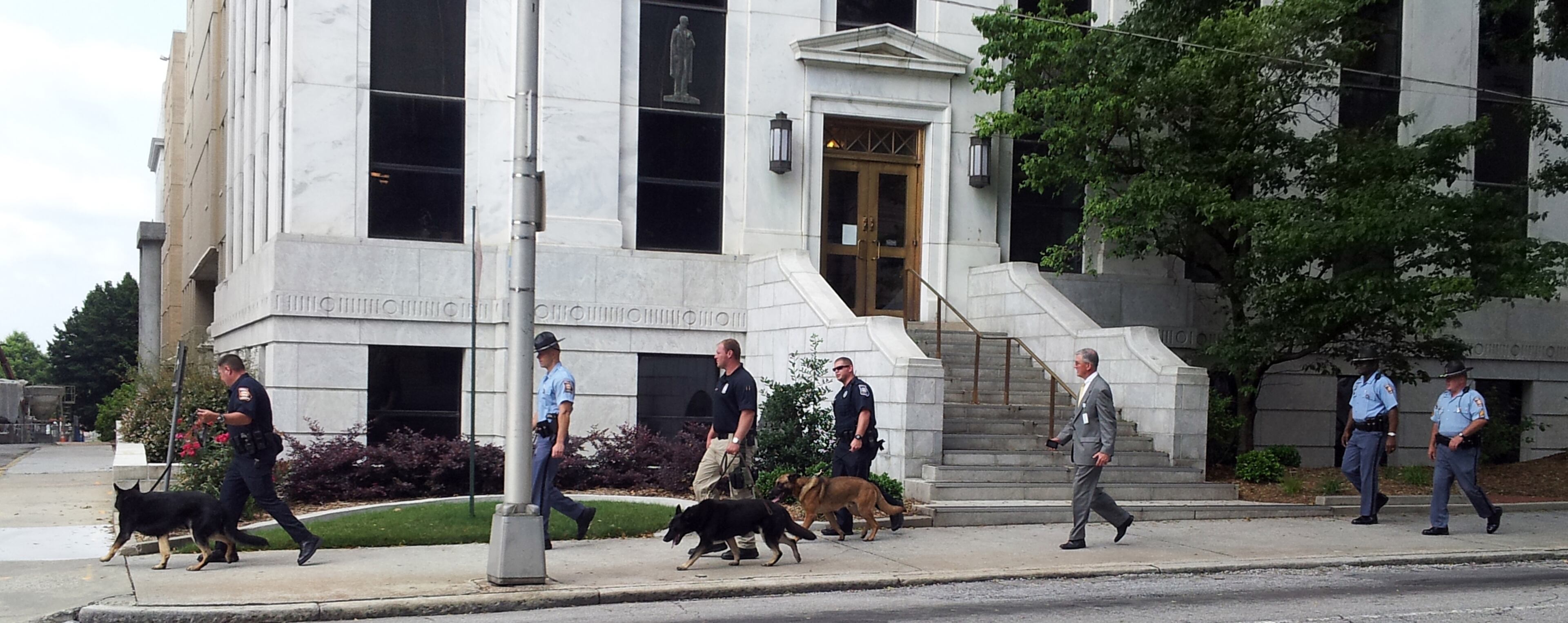 State law enforcement officials investigated a pair of bomb threats near the Georgia Capitol earlier today.