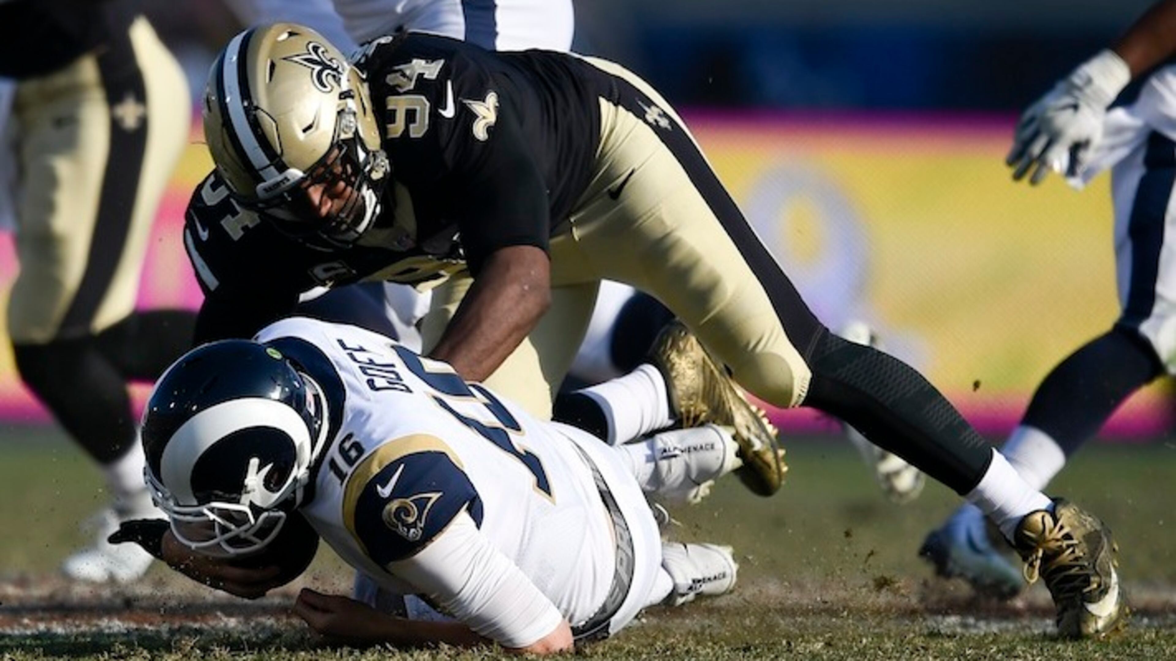 Los Angeles Rams quarterback Jared Goff, bottom, is sacked by is tackled by New Orleans Saints defensive end Cameron Jordan during the first half of an NFL football game, Sunday, Nov. 26, 2017, in Los Angeles. (AP Photo/Kelvin Kuo)
