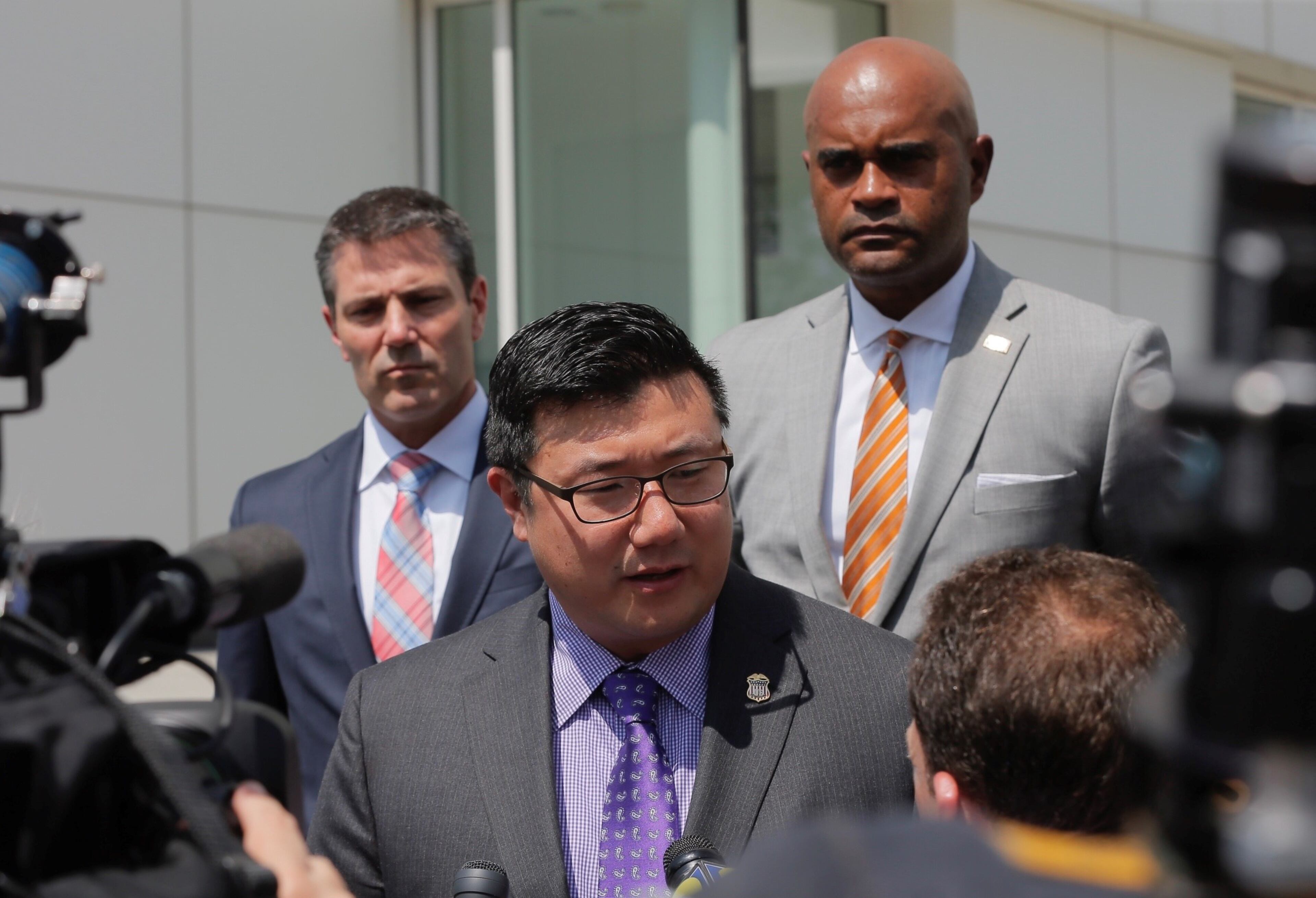U.S. Attorney Byung J. "BJay" Pak, along with Chris Hacker, FBI Special Agent in charge and Thomas Holloman III, IRS investigator, talk to media after Wednesday's hearing. Bob Andres / bandres@ajc.com