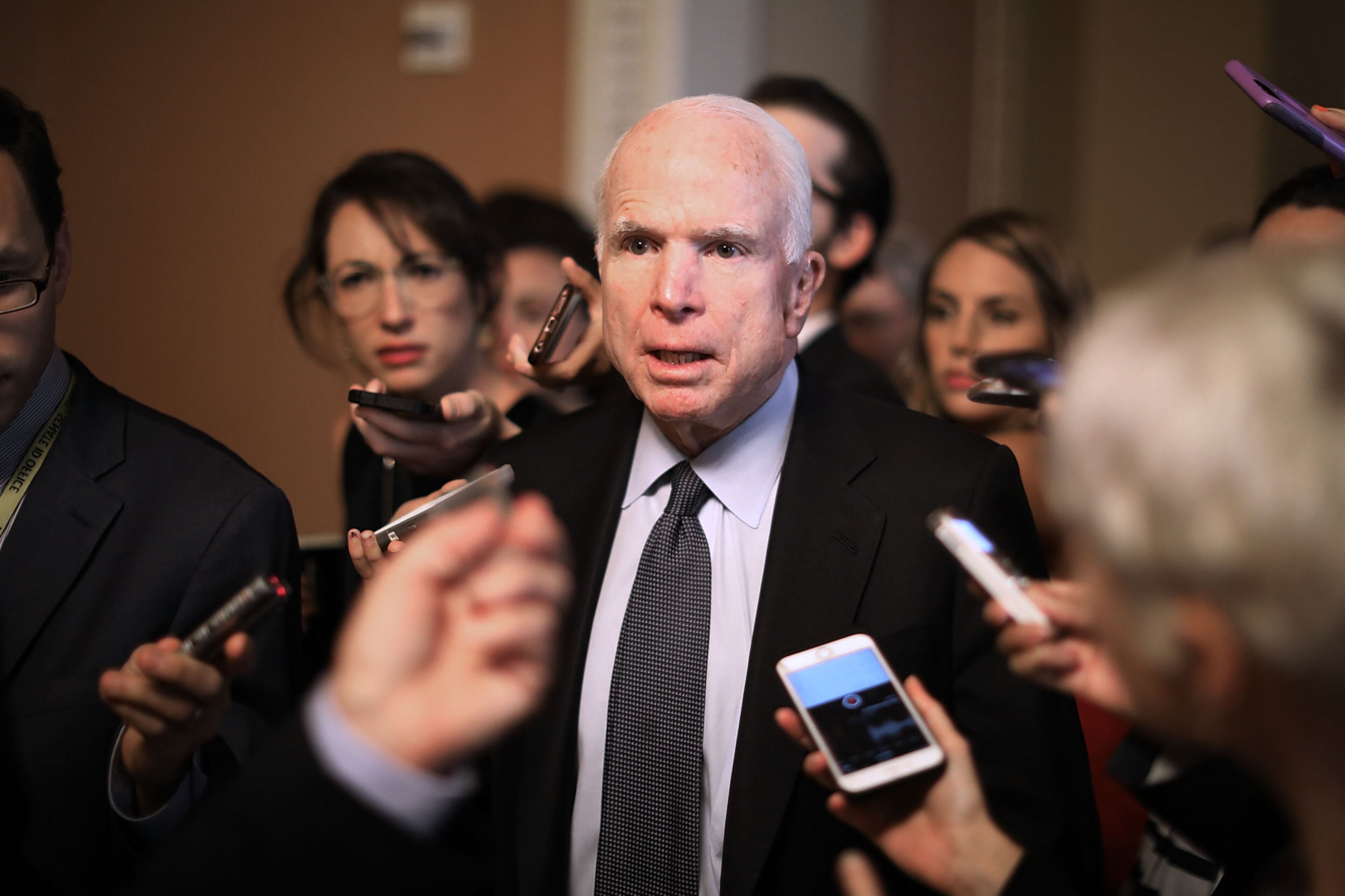 WASHINGTON, DC - JULY 13: Sen. John McCain (R-AZ) leaves a meeting where a new version of a GOP healthcare bill was unveiled to Republican senators at the U.S. Capitol July 13, 2017 in Washington, DC. The latest version of the proposed bill aims to repeal and replace the Affordable Care Act, also knows as Obamacare. (Photo by Chip Somodevilla/Getty Images) ***BESTPIX***