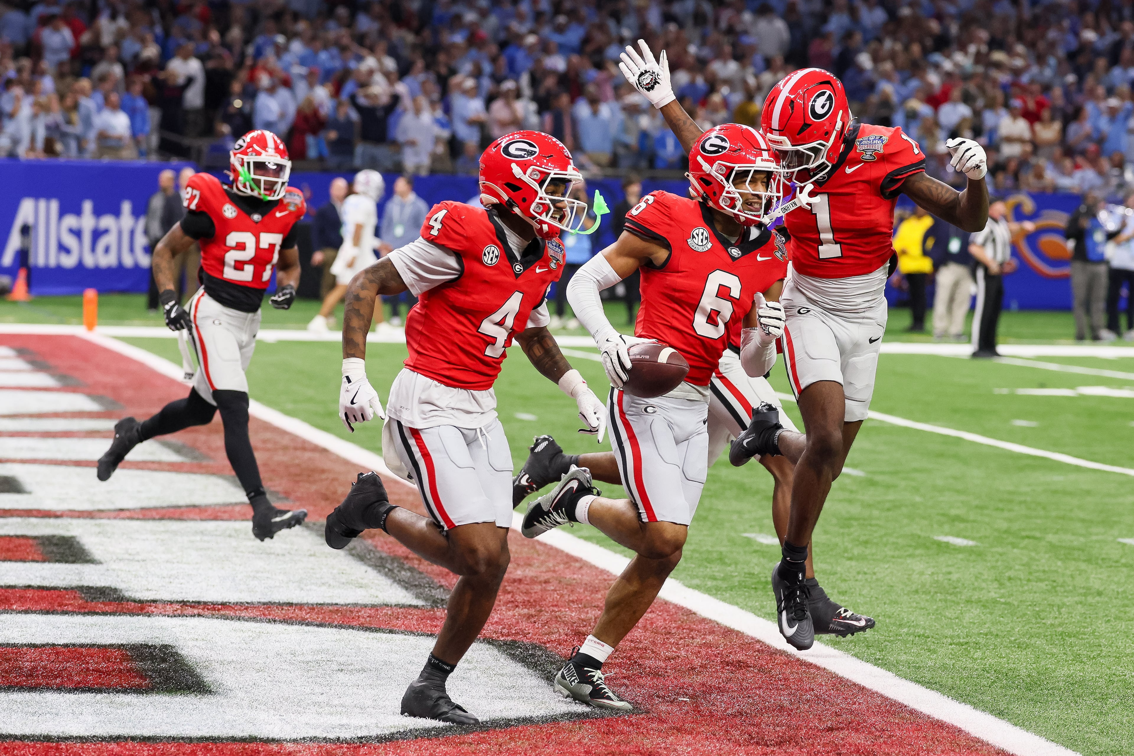 Georgia Bulldogs defensive back Daylen Everette (6) celebrates a fumble recovery for a 47 yard touchdown against the Ole Miss Rebels during the second quarter of the College Football Playoff quarterfinal game at the Sugar Bowl in the Caesars Superdome, Thursday, Jan. 1, 2026, in New Orleans. (Jason Getz/AJC)