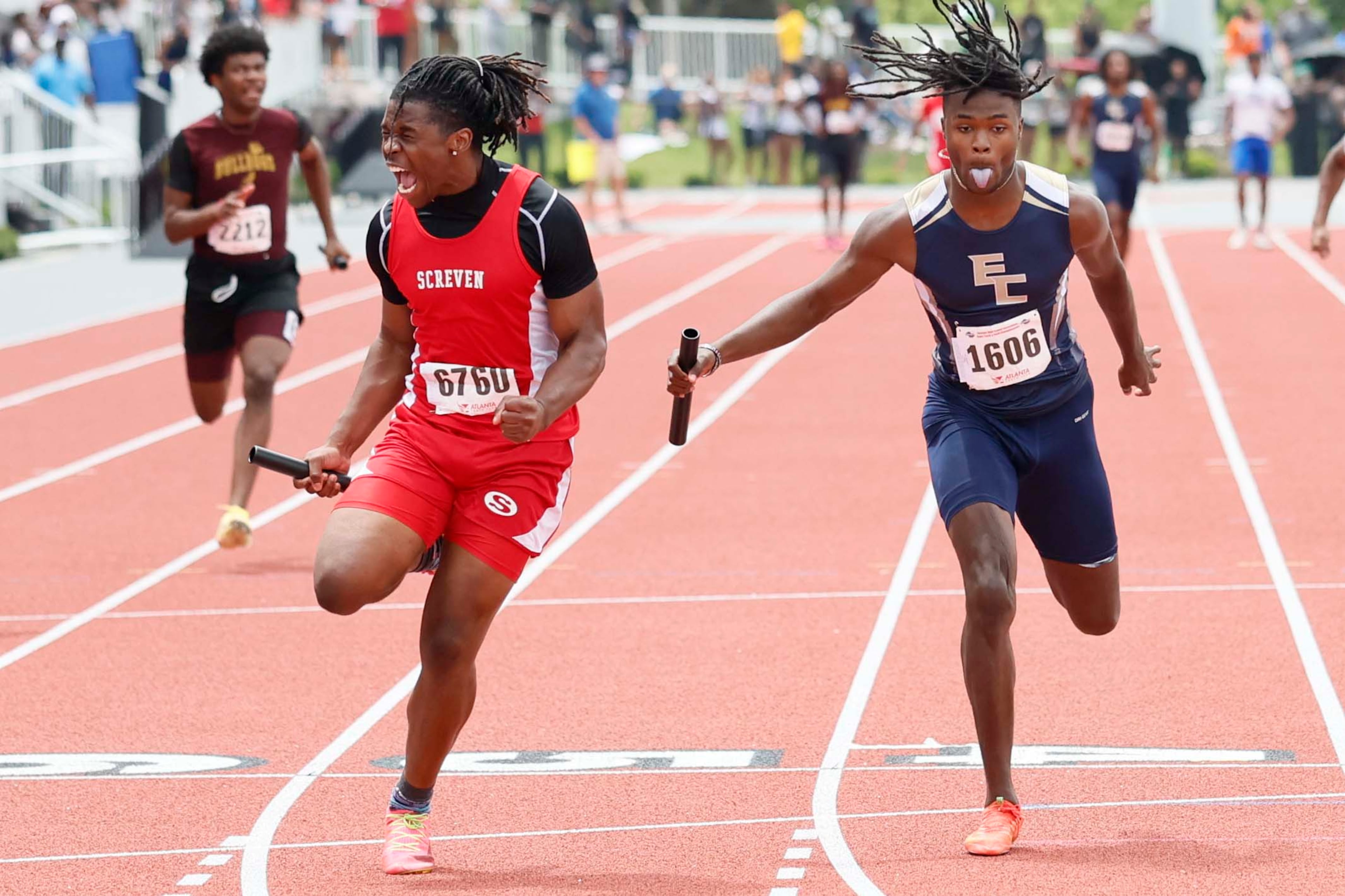 Screven County High School runner in red reacts after crossing the finish line, helping his team win the Boys 4x100 Meter Relay Division 2 section 2 during the GHSA track and field state championship at UGA Spec Towns Track on Monday, May 11, 2026, in Athens.
(Miguel Martinez/AJC)