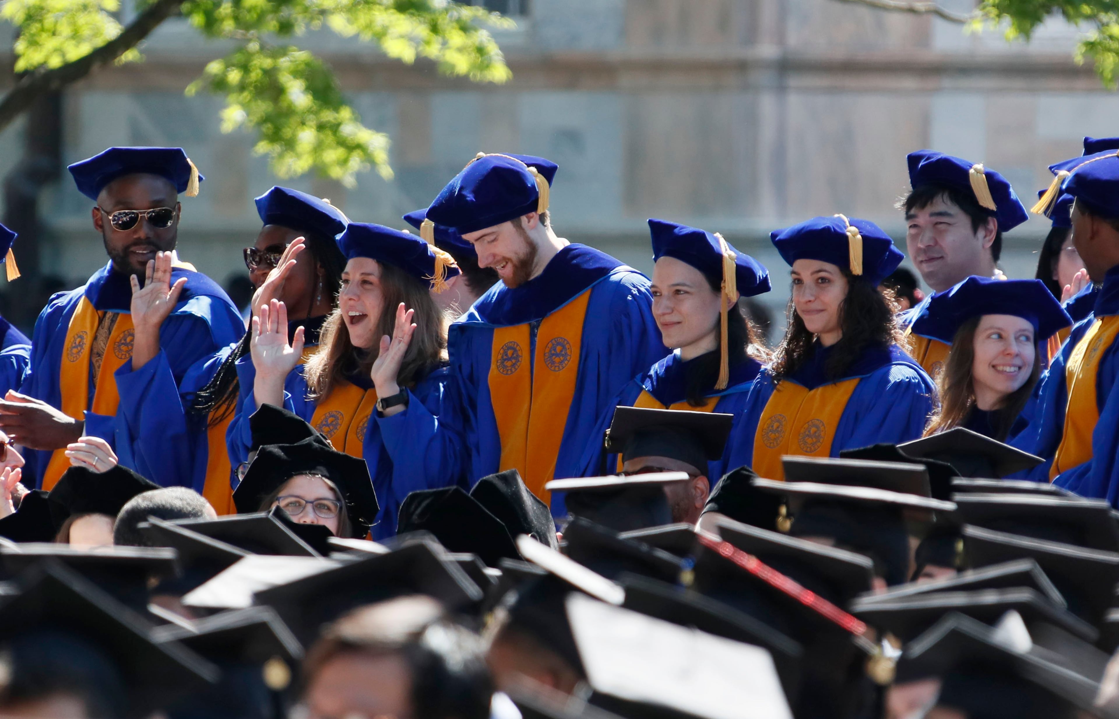 Doctor of Philosophy graduates cheer as their degrees are conferred. Claire E. Sterk, the university's 20th president, presided over the 174th commencement exercises on Monday, May 13, 2019. Andrew Young, former Atlanta mayor and civil rights activist, delivered the keynote address. Bob Andres / bandres@ajc.com