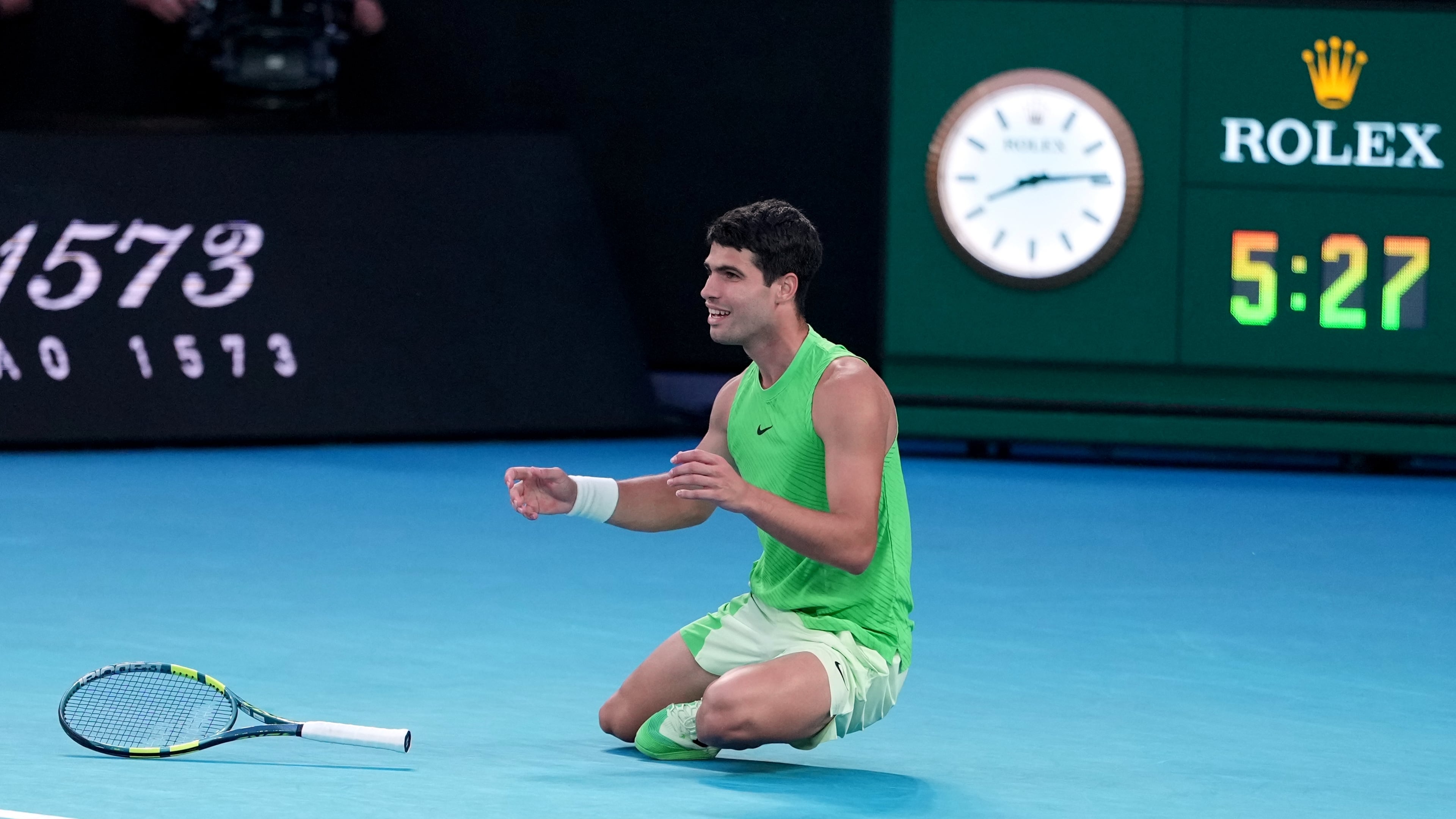 Carlos Alcaraz of Spain celebrates after defeating Alexander Zverev of Germany in their semifinal match at the Australian Open tennis championship in Melbourne, Australia, Friday, Jan. 30, 2026. (AP Photo/Asanka Brendon Ratnayake)