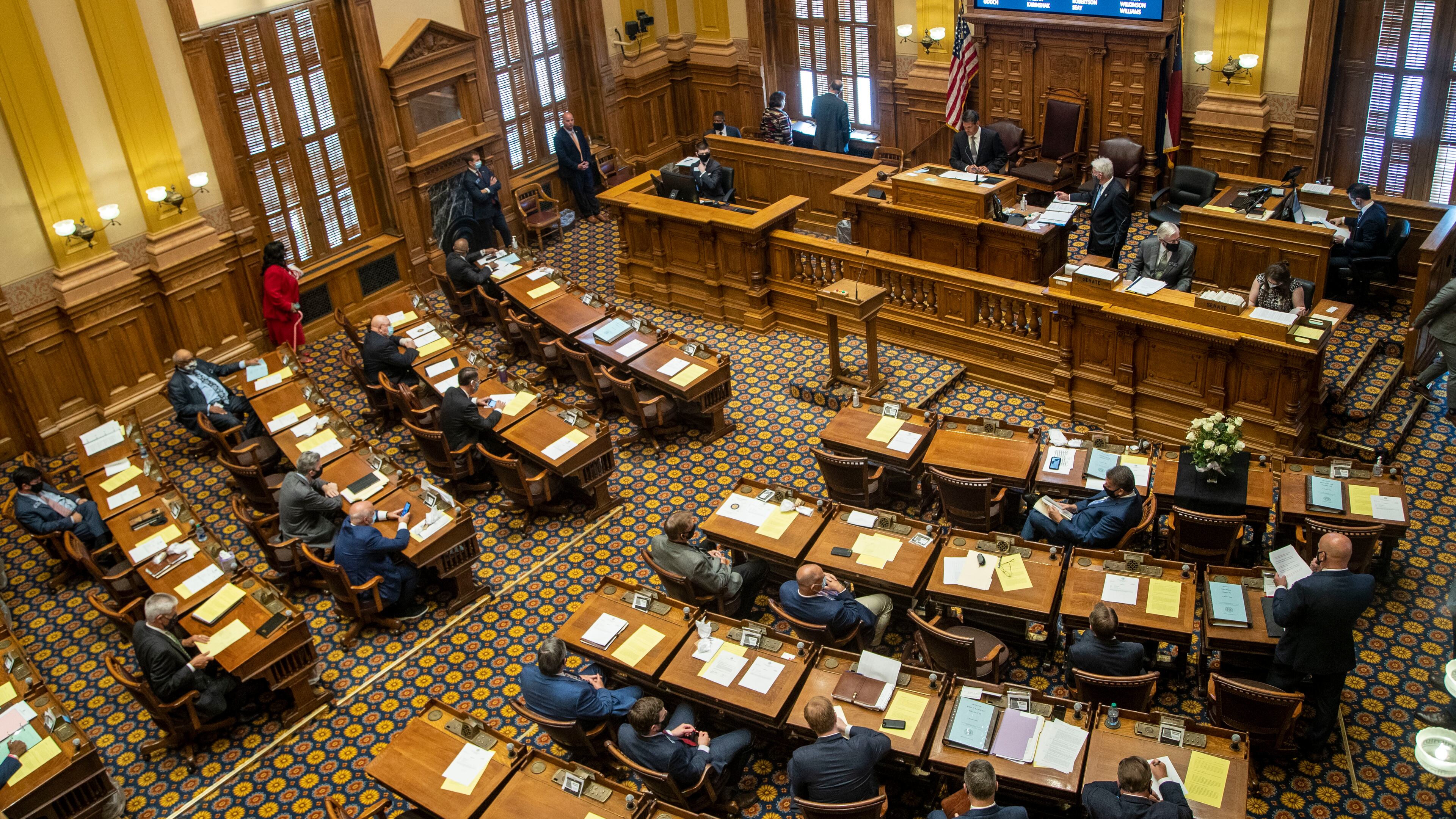 06/15/2020 - Atlanta , Georgia - Senators gather in the Senate chambers on the 30th day of the legislative session at the Georgia State Capitol building in Atlanta, Monday, June 15, 2020. The legislative session returned on Monday following a break due to COVID-19. (ALYSSA POINTER / ALYSSA.POINTER@AJC.COM)