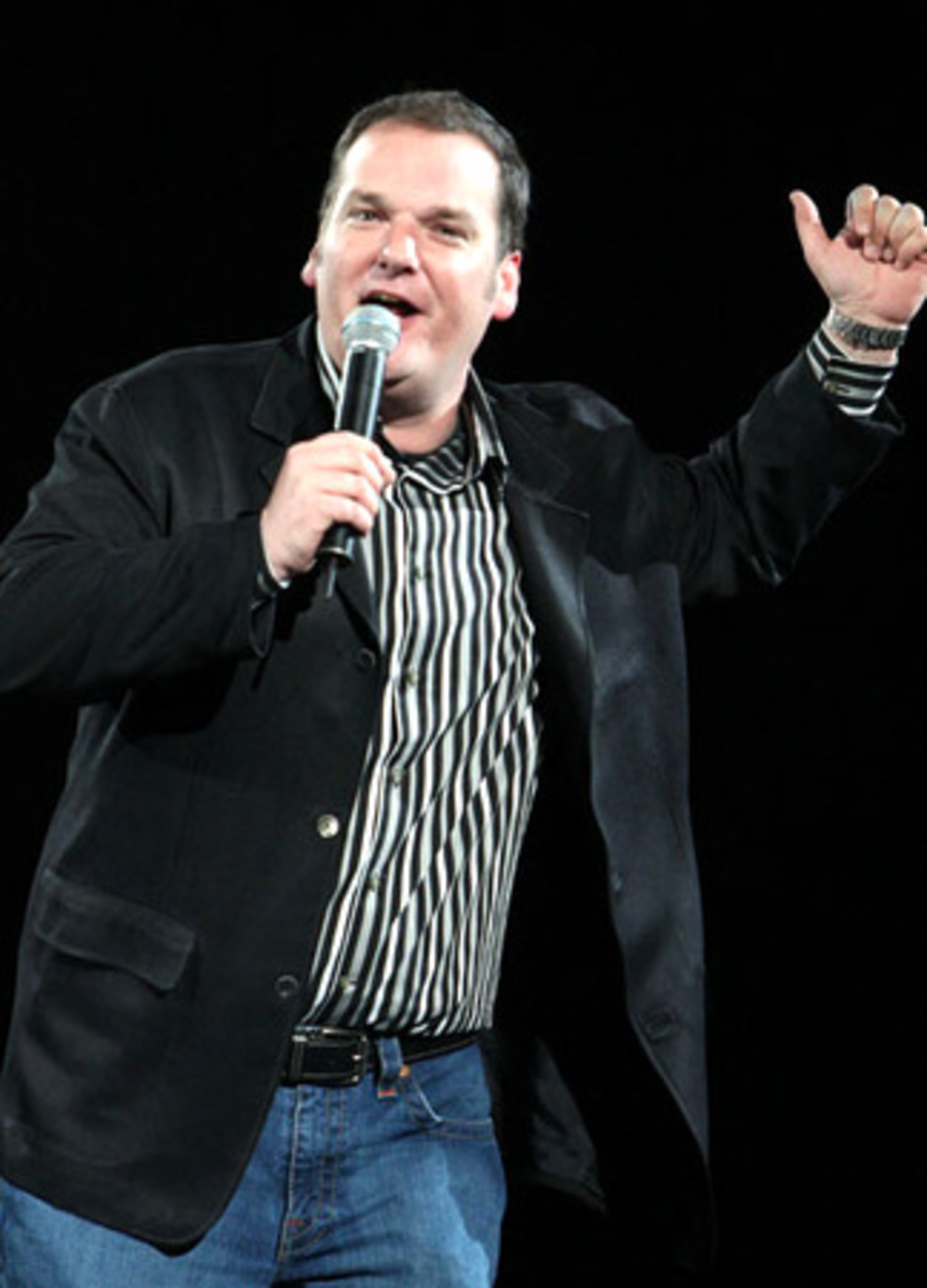 Cadillac Jack welcomes the large crowd at a George Strait concert in 2008. (Robb D. Cohen for the AJC)