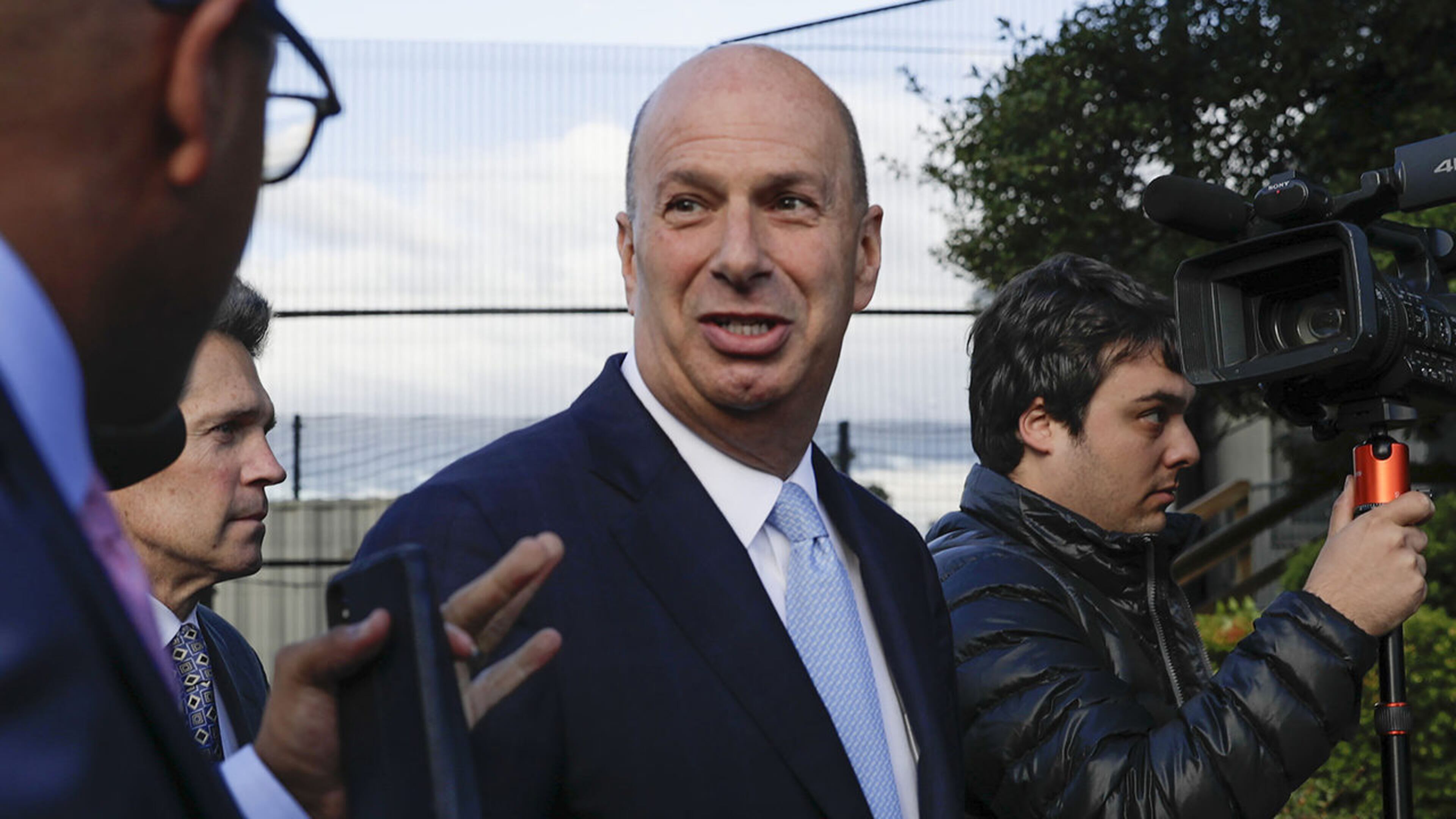 In this Oct. 17, 2019, file photo, U.S. Ambassador to the European Union Gordon Sondland, center, arrives for an interview with the House investigators in Washington