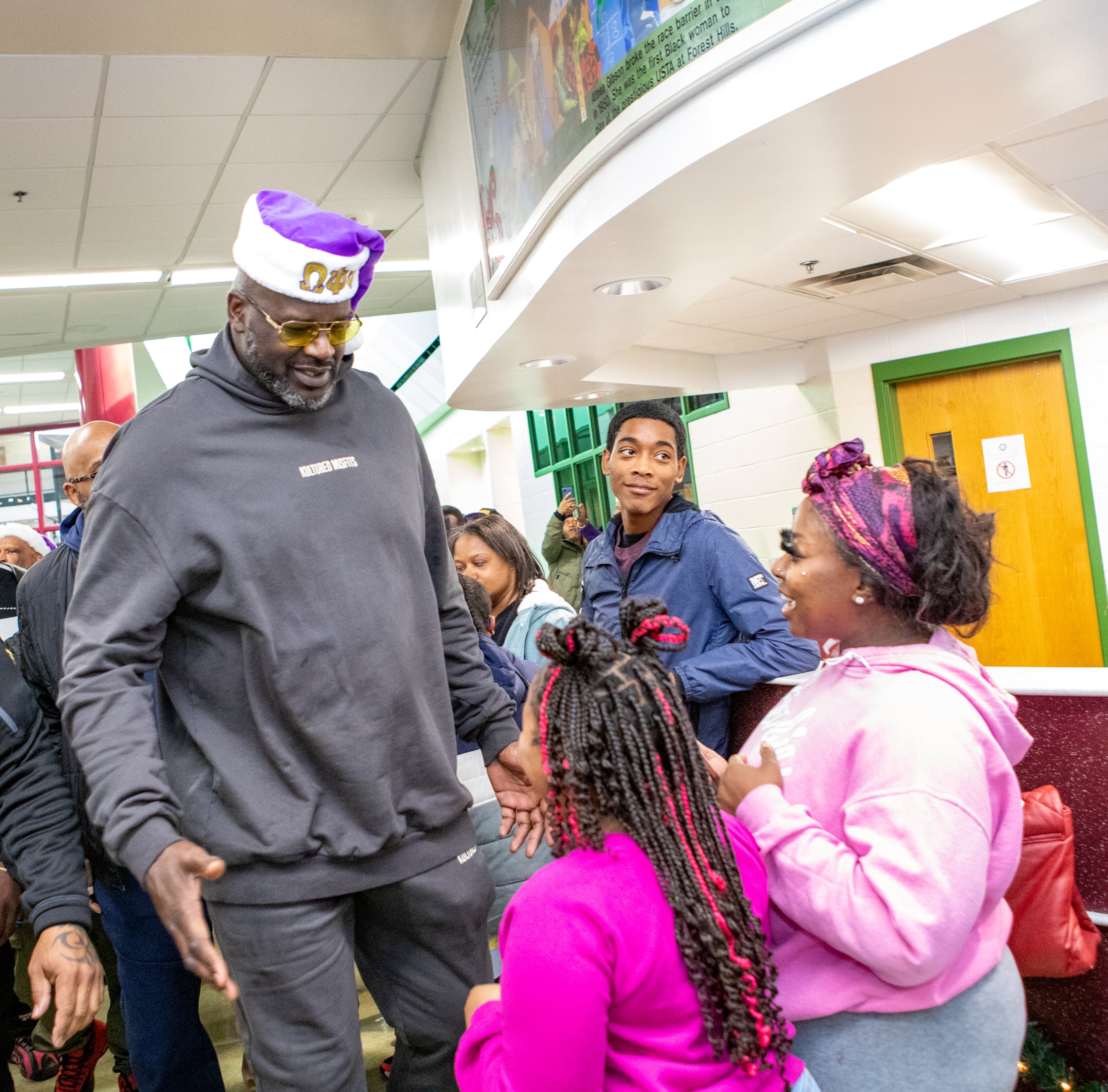 NBA legend Shaquille O’Neal hosts a holiday toy giveaway and meets and greets with his fans at Welcome All Park in the City of South Fulton on Thursday, Dec 21, 2023. (Jenni Girtman for The Atlanta Journal-Constitution)