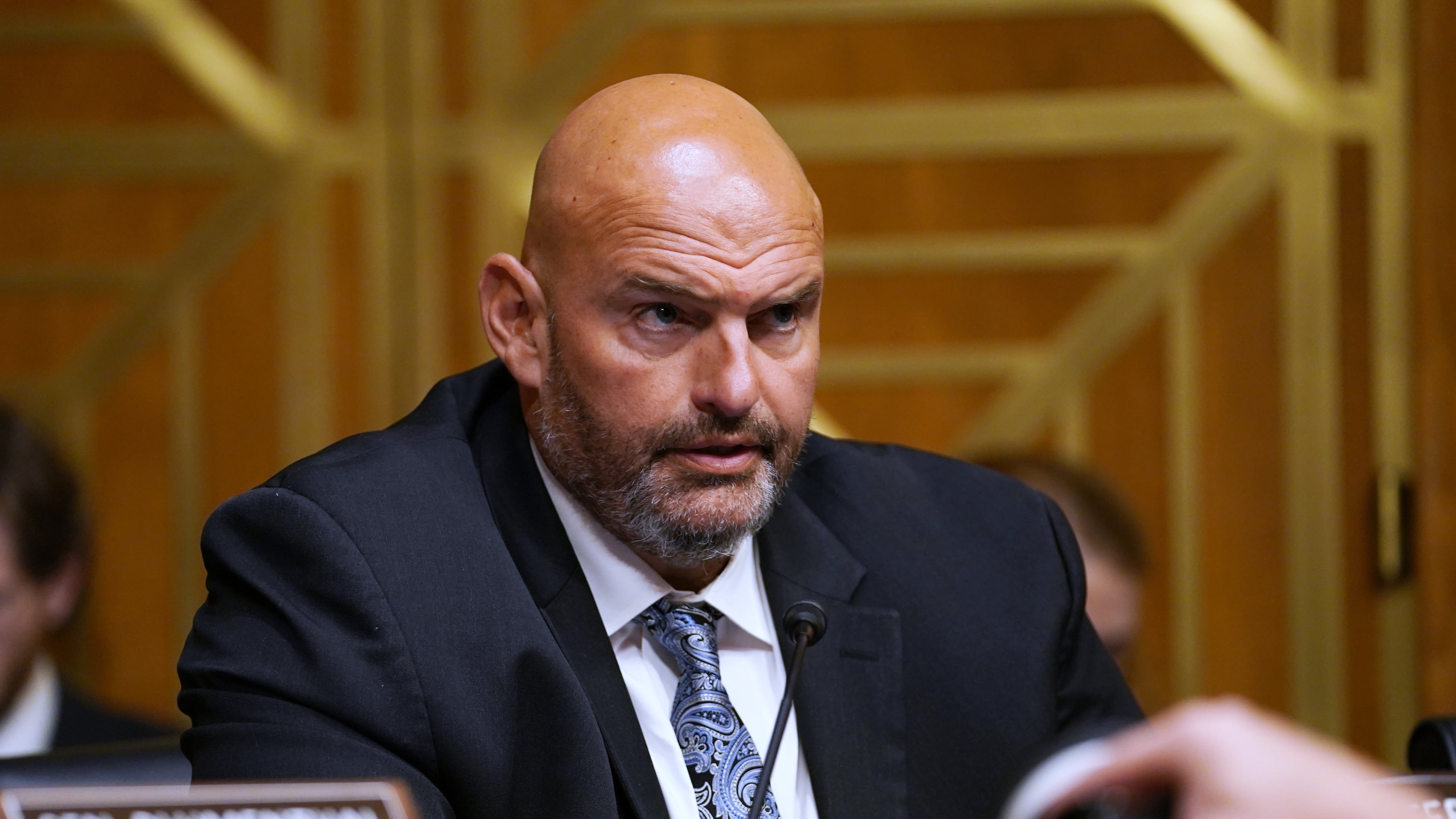FILE - Sen. John Fetterman, D-Pa., speaks as Dr. Anthony Fauci appears before the Senate Homeland Security and Governmental Affairs Committee at the Capitol, July 29, 2026, in Washington. (AP Photo/Allison Robbert, File)