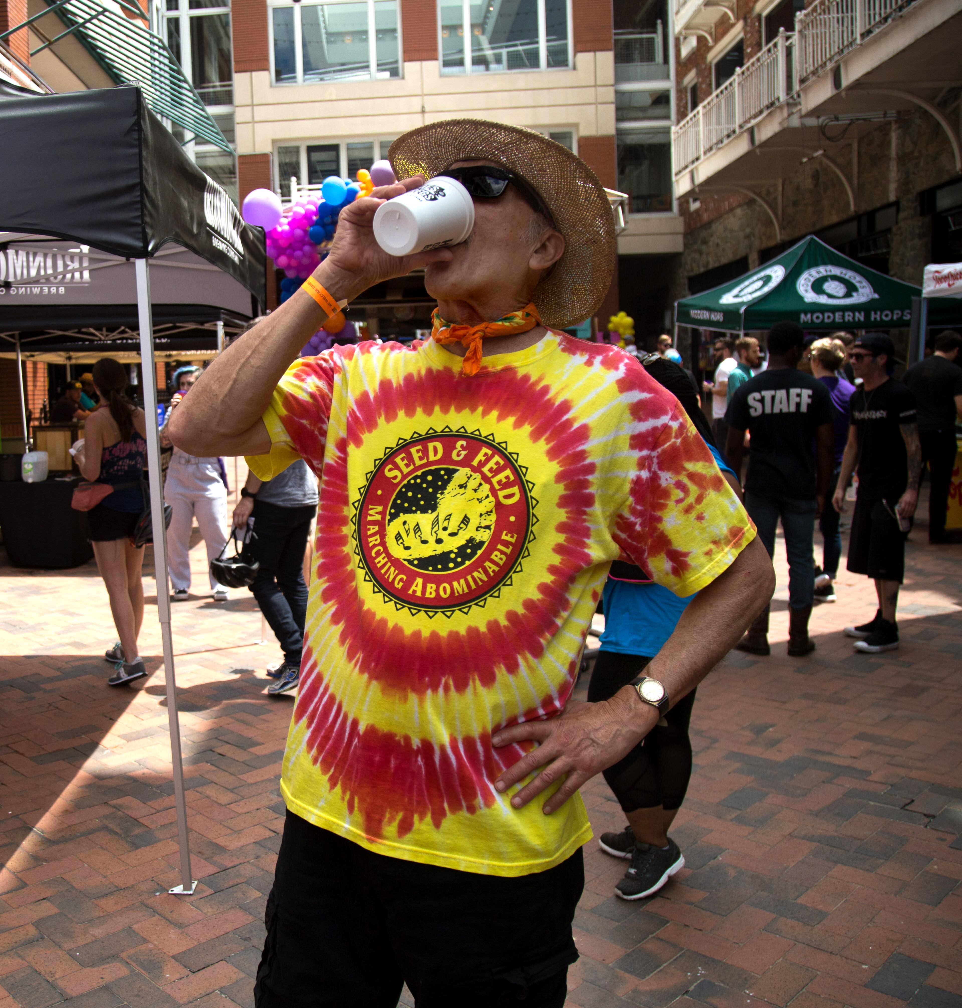 Sam Garafalo takes a drink of beer during The Dames + Dregs Beer Festival at Kenny's Alley in Atlanta GA August 11, 2018. STEVE SCHAEFER / SPECIAL TO THE AJC