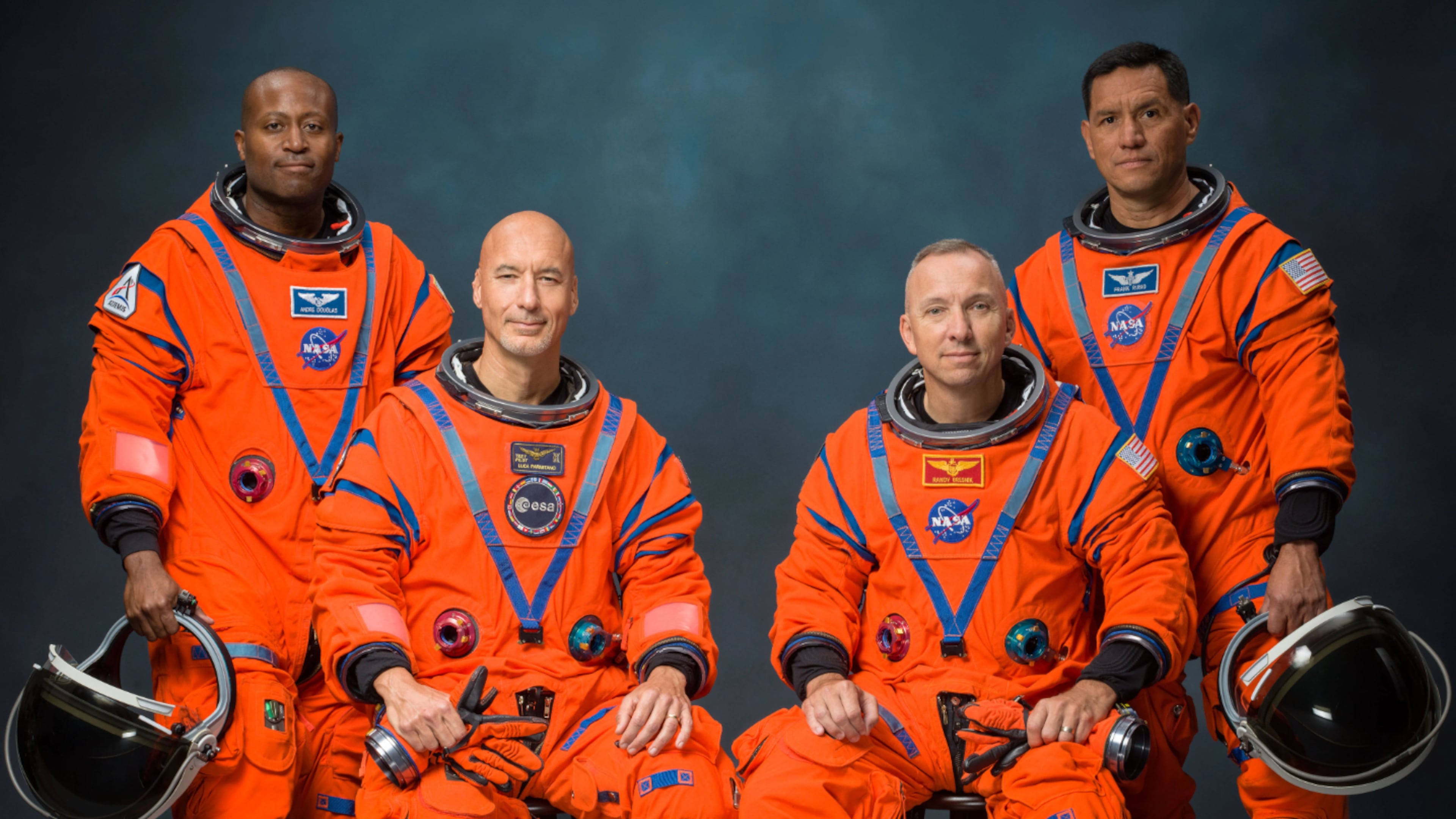 This undated photo provided by NASA Tuesday, June 9, 2026, shows the Artemis III crew including, from left, Andre Douglas, Luca Parmitano, Randy Bresnik and Frank Rubio, posing for an official portrait. (Bill Stafford/NASA via AP)