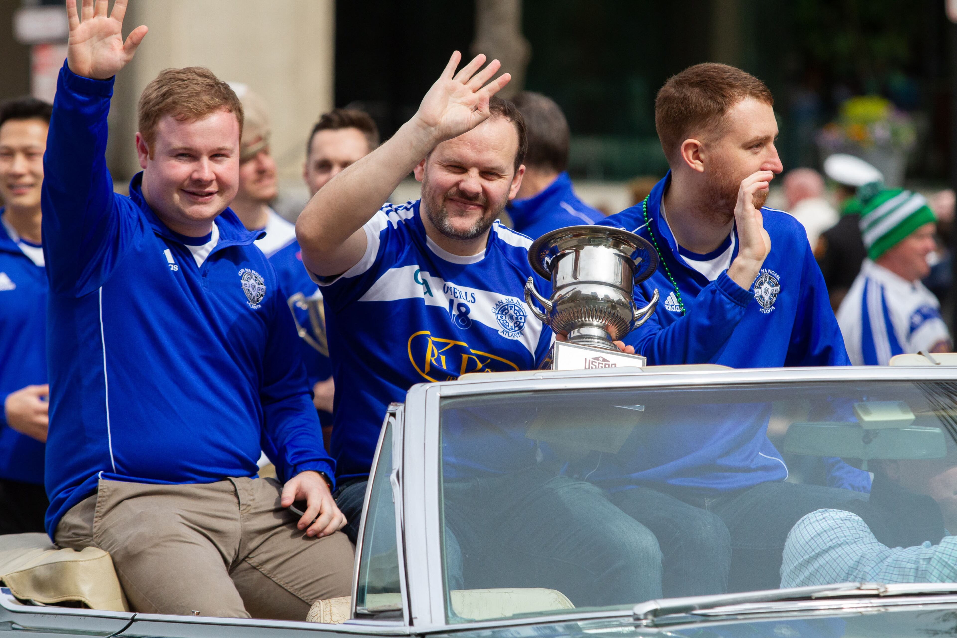 Members of the 2018 Gaelic football National Championship team wave to the crowd during the Atlanta St. Patrick's Parade, March 16, 2019. (Photo: STEVE SCHAEFER / SPECIAL TO THE AJC)