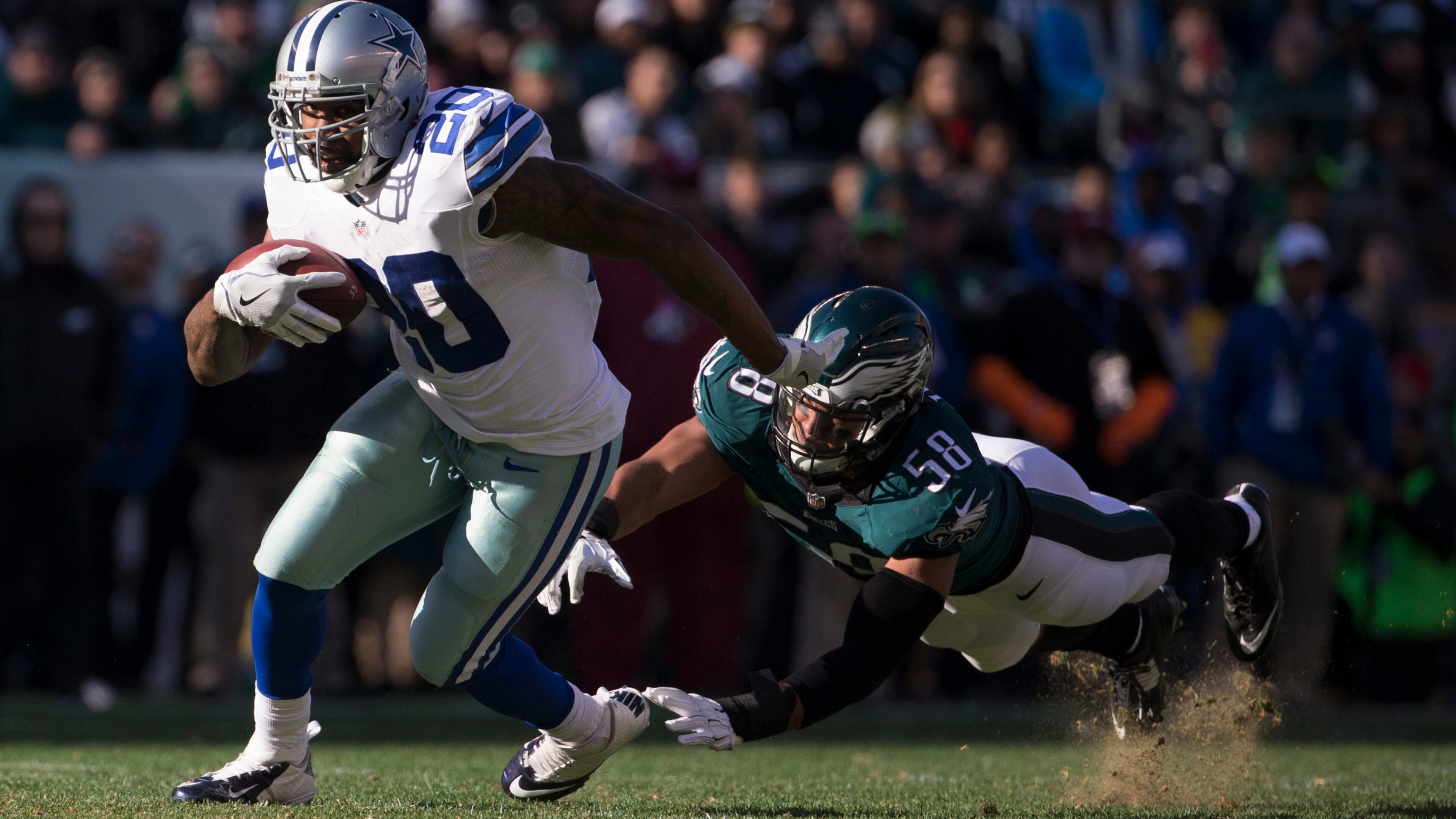 The likely pending suspension of Cowboys running back Ezekiel Elliott make bring backup Darren McFadden back into the light. He's seen here running past Jordan Hicks of the Eagles in an January 1 game at Lincoln Financial Field in Philadelphia, Pa.