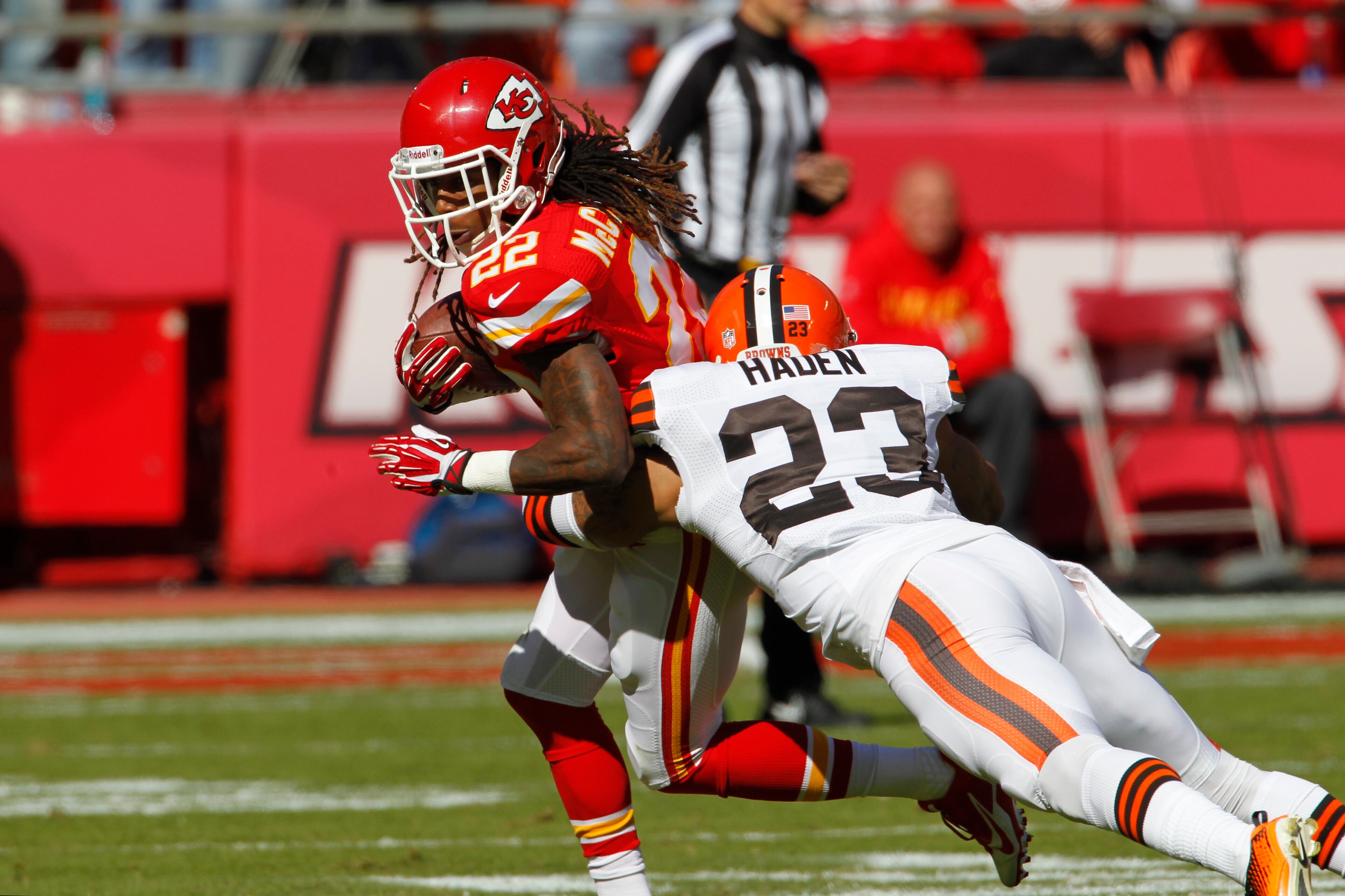 Kansas City Chiefs wide receiver Dexter McCluster (22) is tackled by Cleveland Browns cornerback Joe Haden (23) during an NFL football game at Arrowhead Stadium in Kansas City, Mo. The Kansas City Chiefs beat the Cleveland Browns 23-17 and remain the NFL's only undefeated team. (AP Photo/Colin E. Braley)