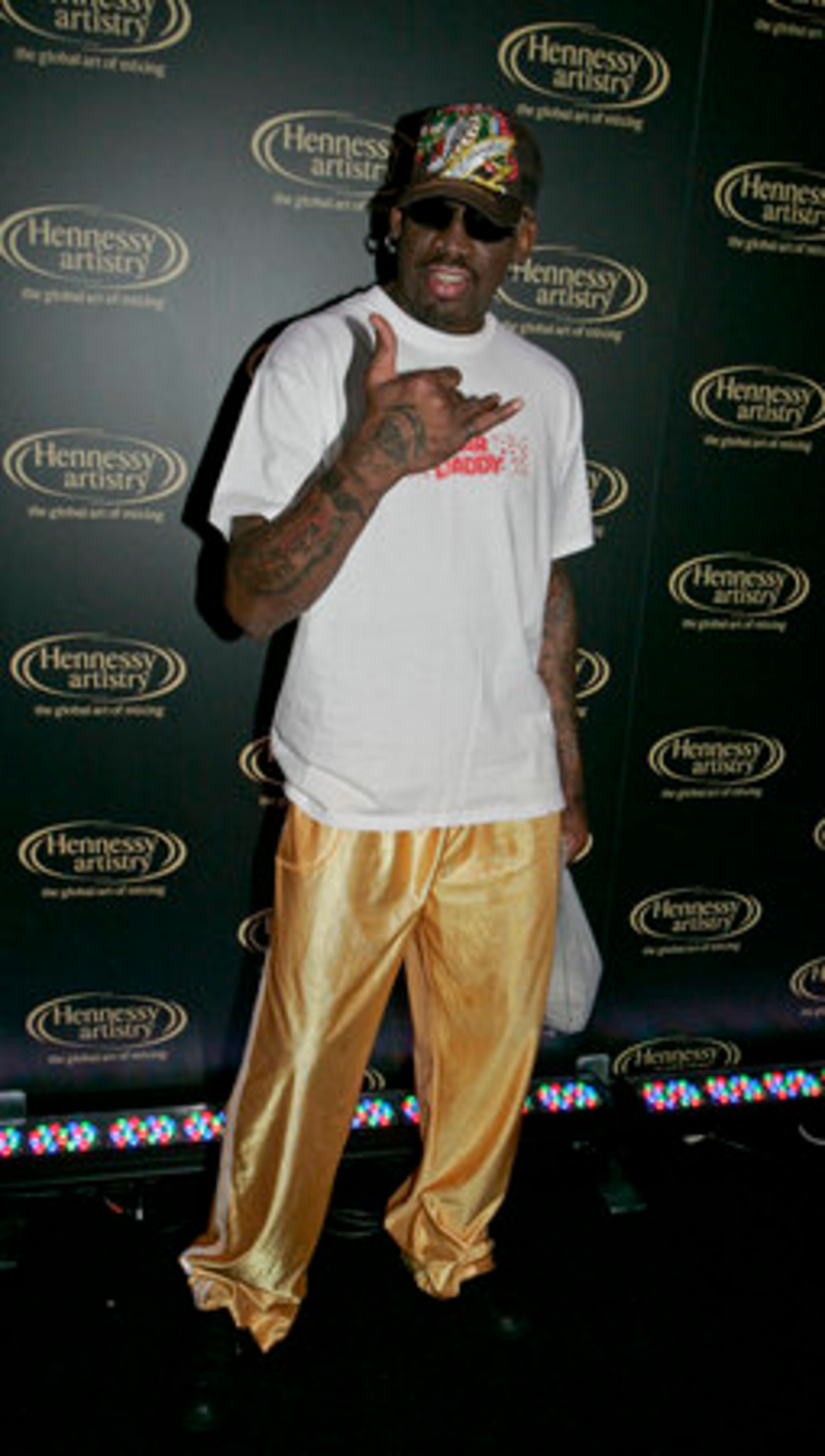 Retired basketball player Dennis Rodman, who played for the Detroit Pistons, graced the event with his presence.