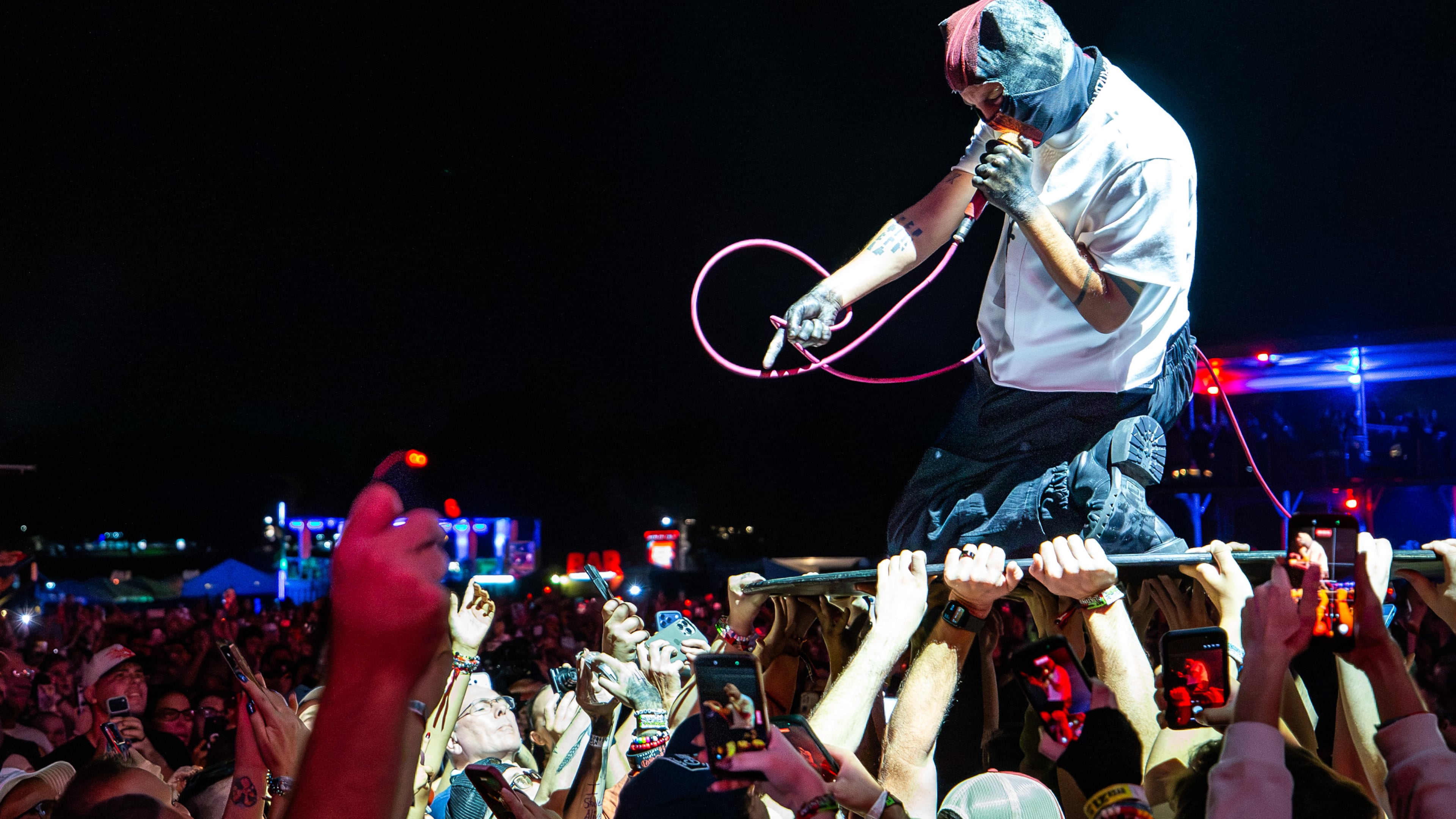 After a lengthy rain delay and evacuation, 21 Pilots closed out Saturday night at Shaky Knees with genre bending hits on the Peachtree Stage on Sept. 19, 2026, in Atlanta. (Ryan Fleisher for the AJC)