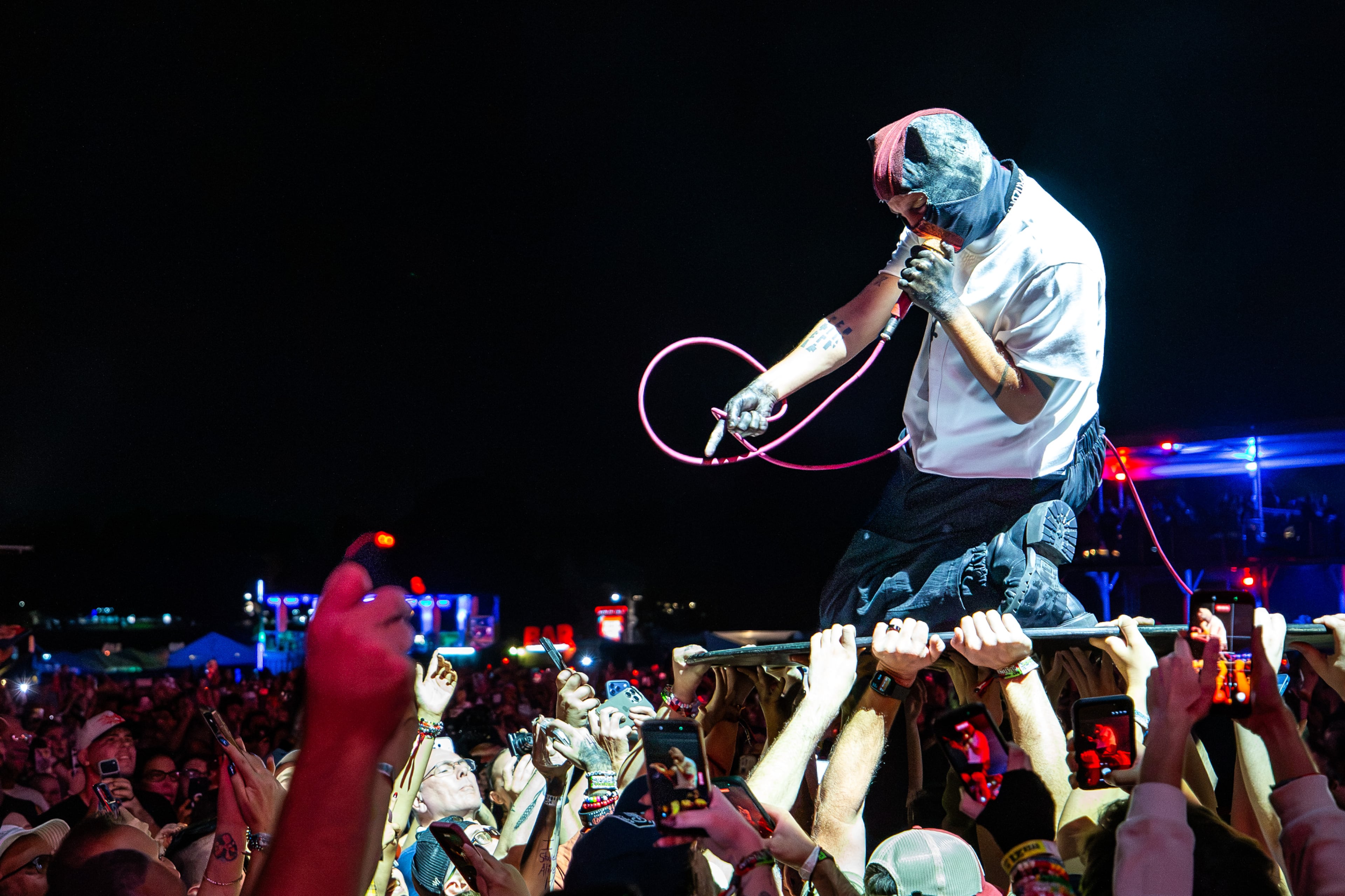 After a lengthy rain delay and evacuation, 21 Pilots closed out Saturday night at Shaky Knees with genre bending hits on the Peachtree Stage on Sept. 19, 2026, in Atlanta. (Ryan Fleisher for the AJC)