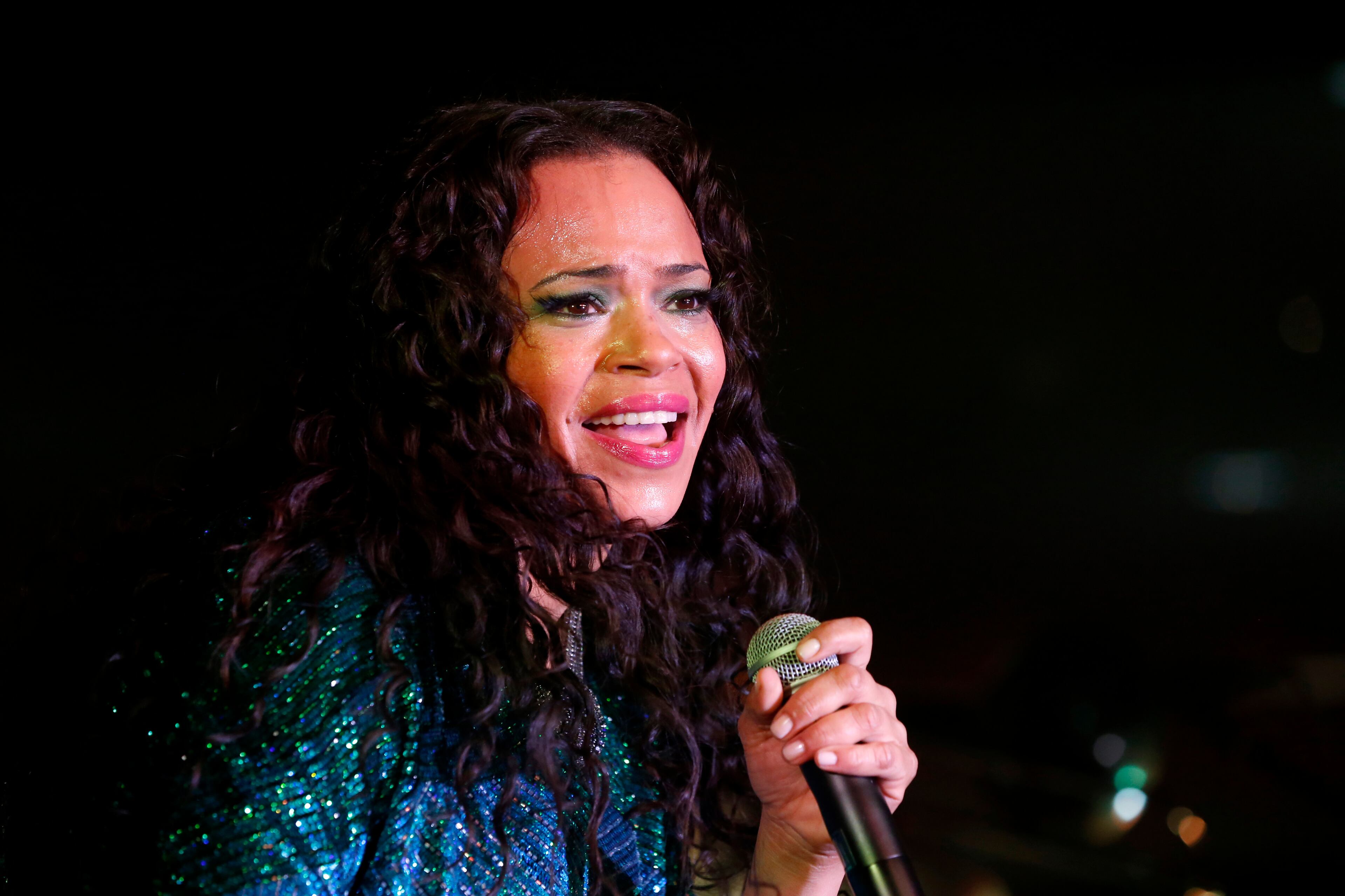 Faith Evans performs at the Essence Festival at the Superdome on Saturday, July 6, 2013, in New Orleans. (Photo by Derick Hingle/Invision for Essence/AP Images)