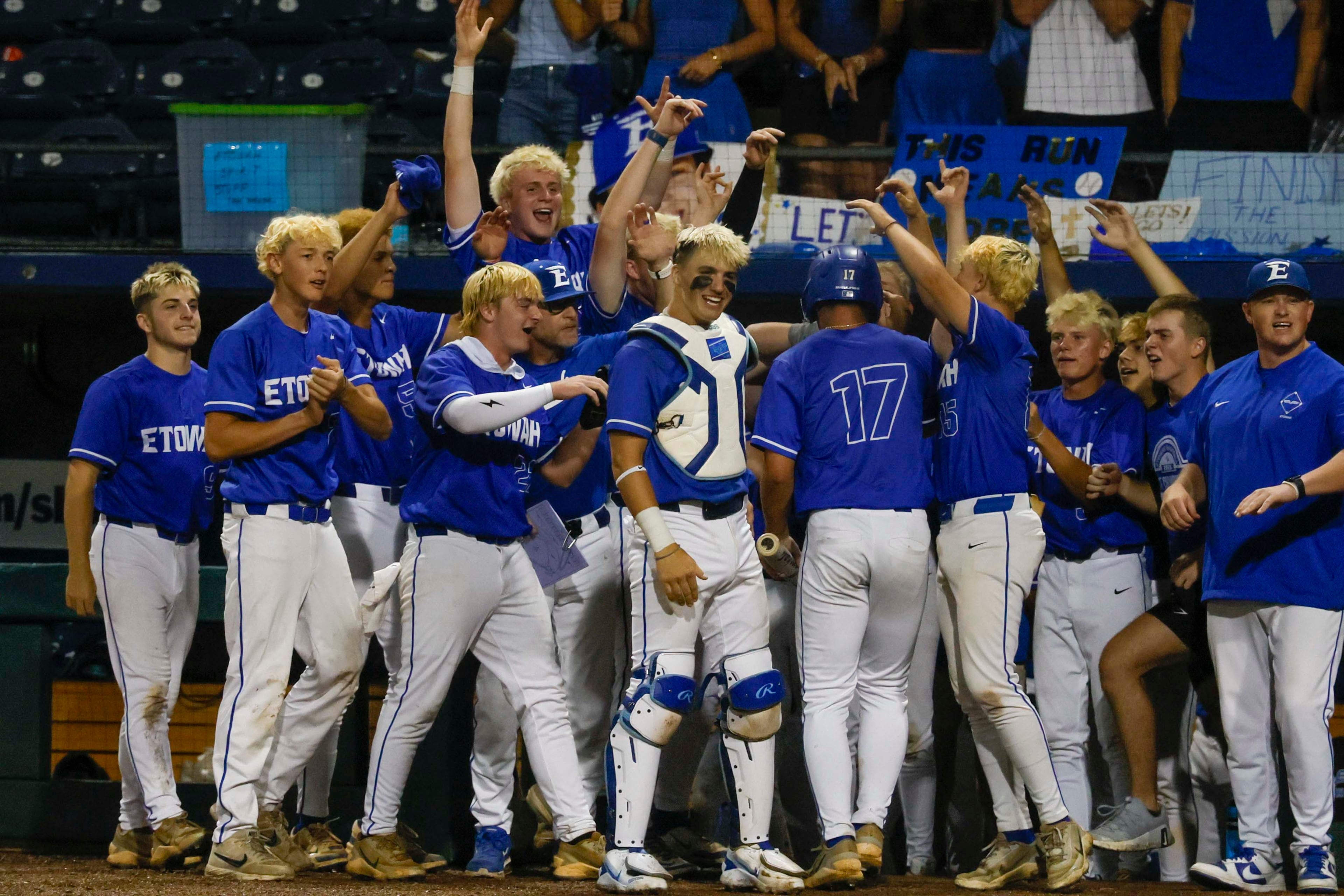 Etowah Eagles players celebrate with first baseman Carson Moore after his run during the second inning of Game 1 of the Class 6A GHSA baseball finals at Gwinnett Field on Tuesday, May 26, 2026, in Lawrenceville, Ga.
(Miguel Martinez/AJC)