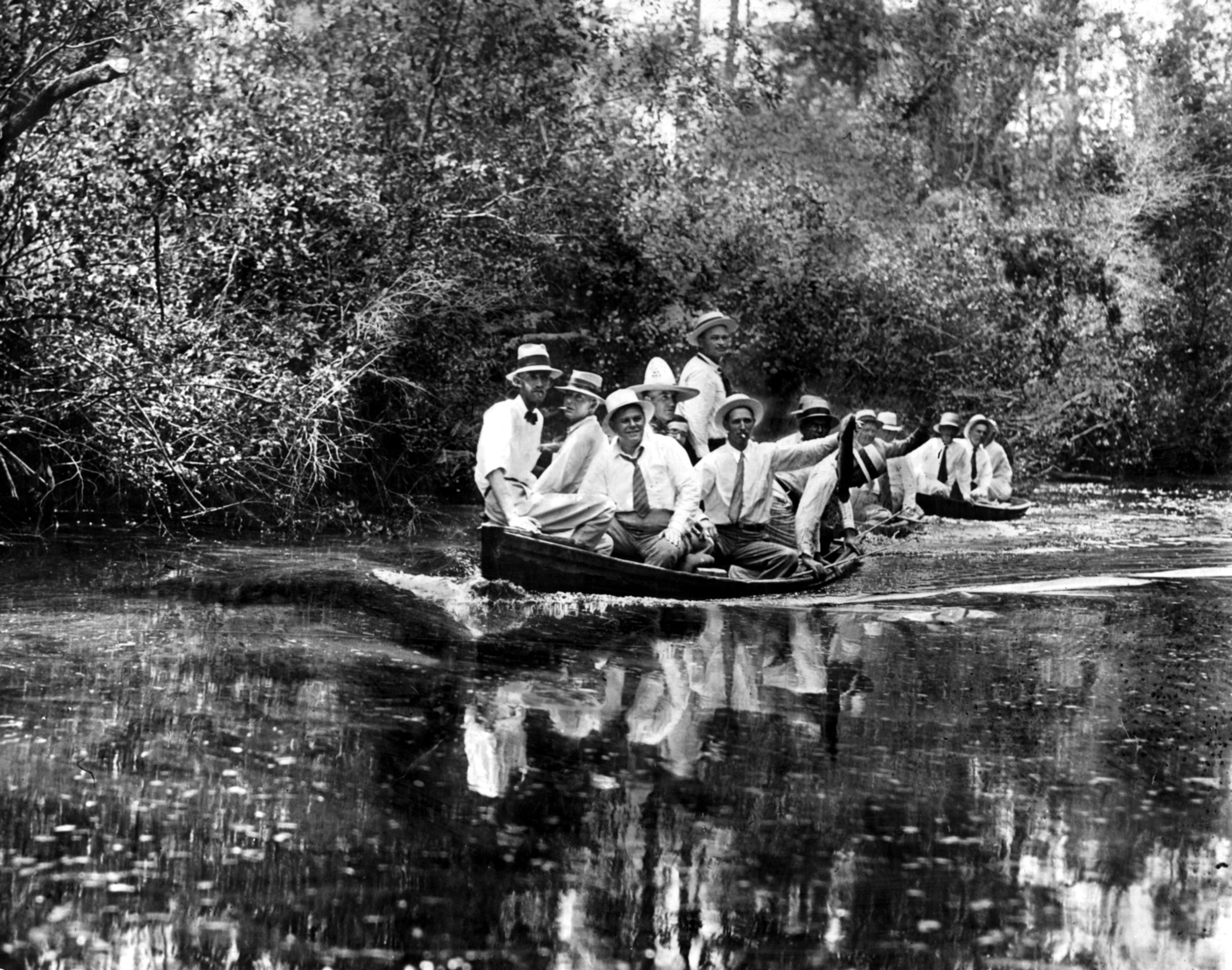 Original caption: "1937 -- As a part of their state-wide conservation program, Conservation Committee of the Georgia Legislature, now in session at the State Capitol in Atlanta, recently took a boat ride through the famous area of 'trembling earth,' which as been proposed as a national park and a wild life refuge." (The Okefenokee National Wildlife Refuge was eventually established in 1937.)