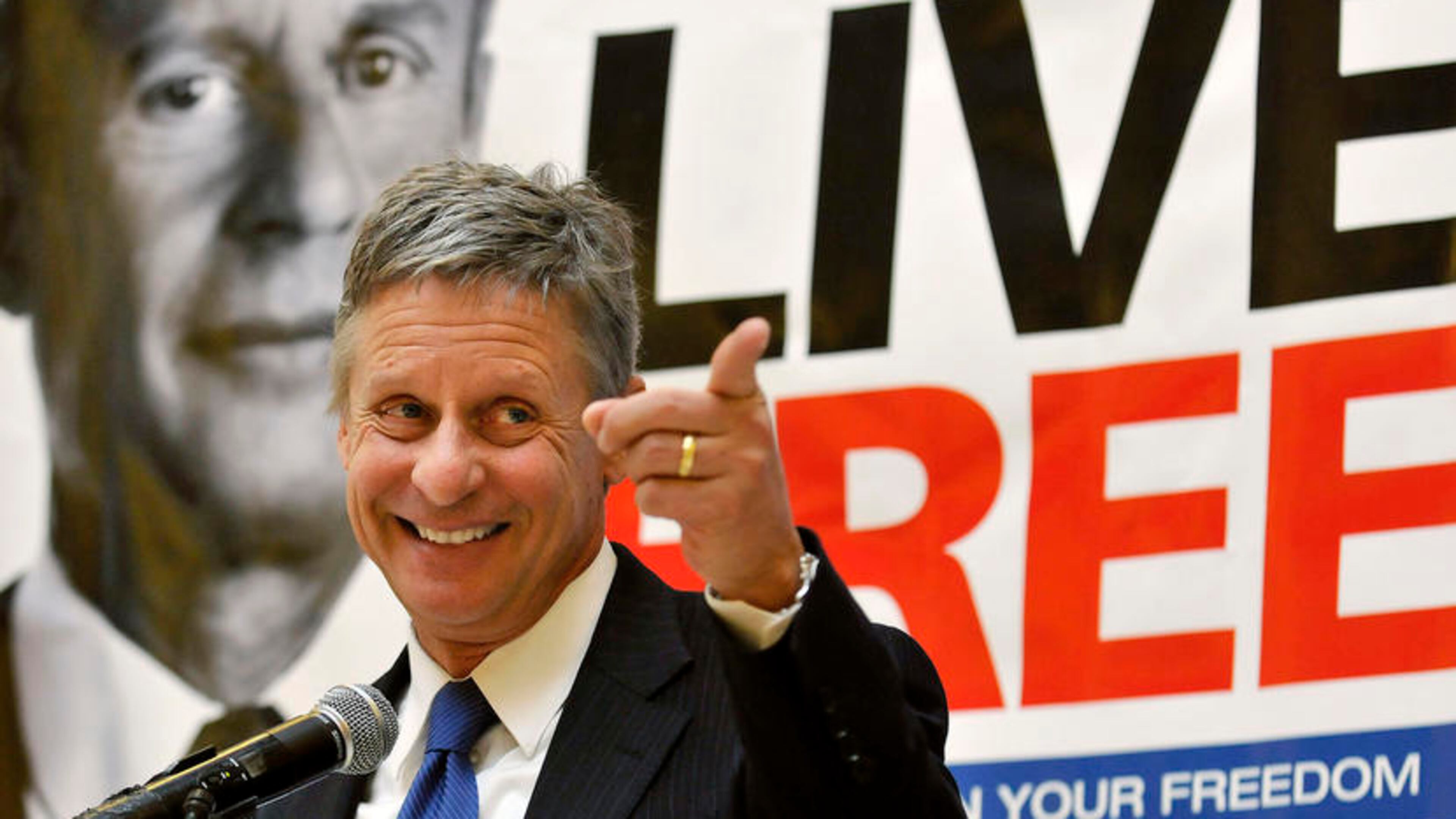 FILE - In this Wednesday, Dec. 28, 2011 file photo, former New Mexico Gov. Gary Johnson speaks at a news conference during which he announced he is leaving the Republican Party in favor of seeking a presidential nomination as a Libertarian, at the State Capitol in Santa Fe, N.M. Something's going on in America this election year: a renaissance of an ideal as old as the nation itself - that live-and-let-live, get-out-of-my-business, individualism vs. paternalism dogma that is the hallmark of libertarianism. But what looms are far larger questions about whether an America fed up with government bans and government bailouts - with government, period - is seeing a return to its libertarian roots. (AP Photo/Albuquerque Journal, Eddie Moore, File)