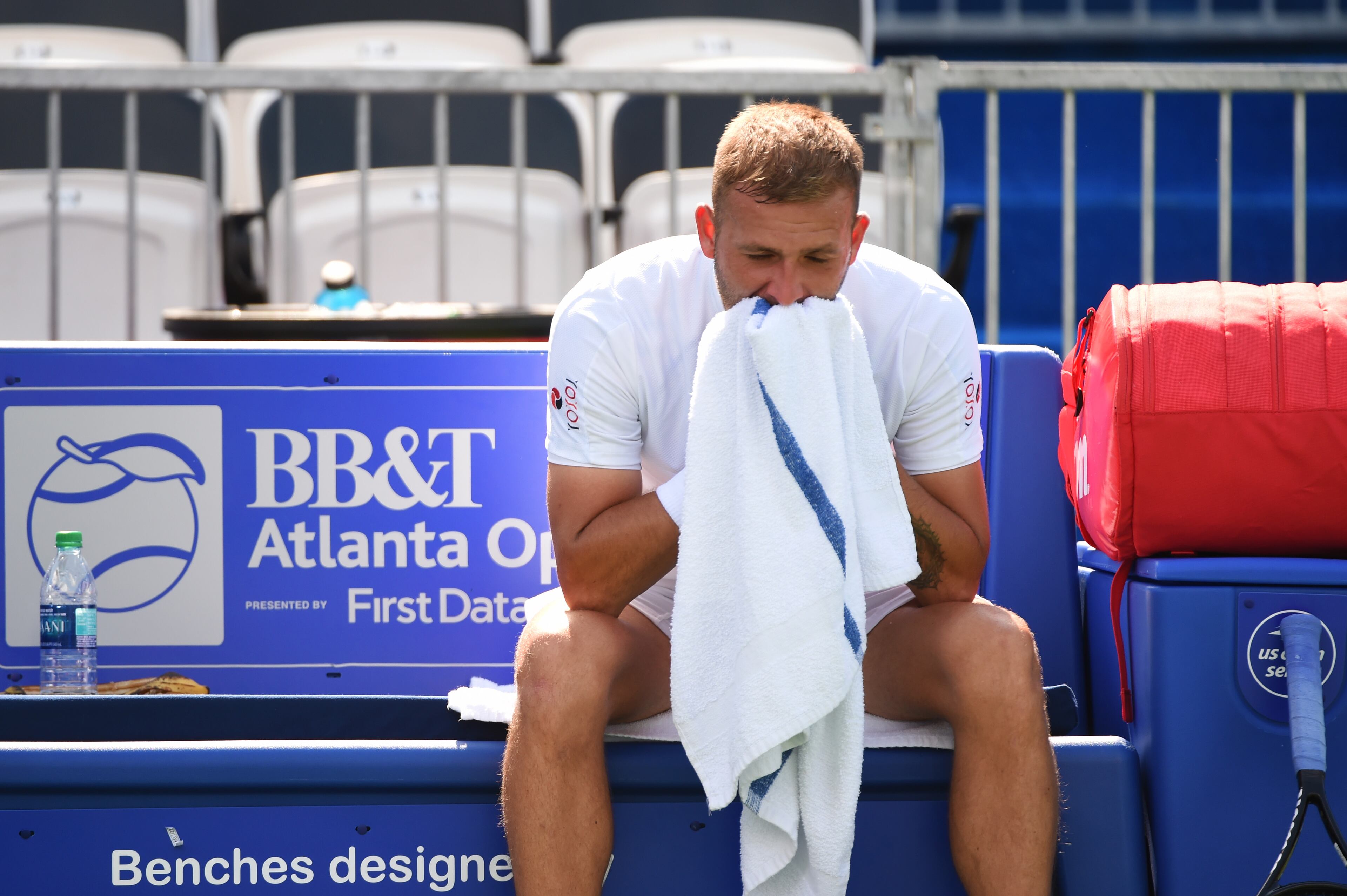 ATLANTA, GEORGIA - JULY 24: Daniel Evans of Great Britain takes a water break during his match against Radu Albot of Moldova during the BB&T Atlanta Open at Atlantic Station on July 24, 2019 in Atlanta, Georgia. (Photo by Logan Riely/Getty Images)