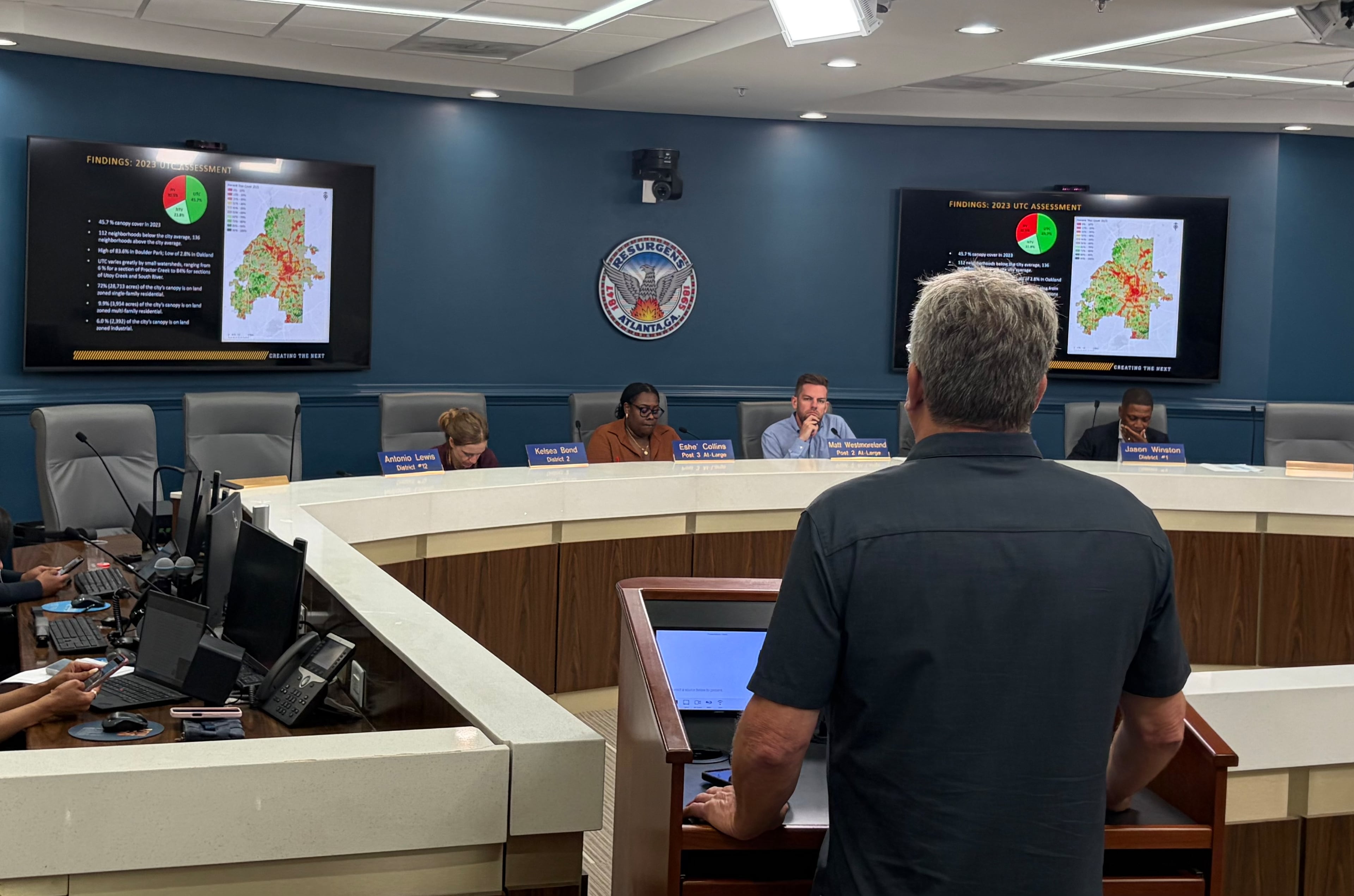 Georgia Tech professor Tony Giarrusso presents his tree canopy report to Atlanta City Council members. Tree coverage over the city dropped almost a percentage point to 45.7% during the years 2018 to 2023. (Bill Torpy/AJC)